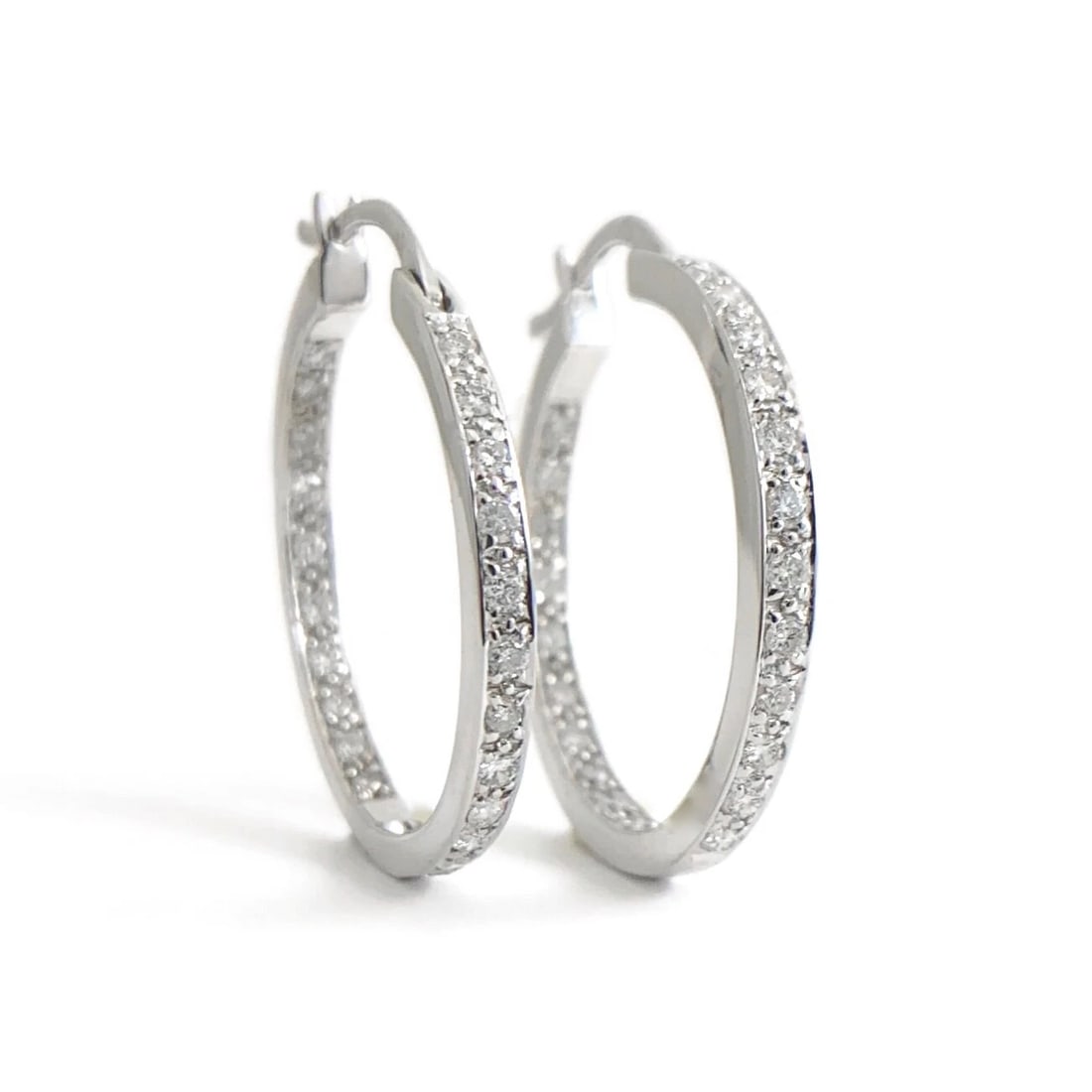 Pave Diamond Inside-Out Hoop Earrings 14K White Gold, 1 Inch, .75 CTW: Pave Diamond Inside-Out Hoop Earrings 14K White Gold, 1 Inch, .75 CTW These are beautiful earrings! Please let us know if you have any questions. Diamonds: 44 round brilliant cuts, .75 ctw, H, SI2 Met