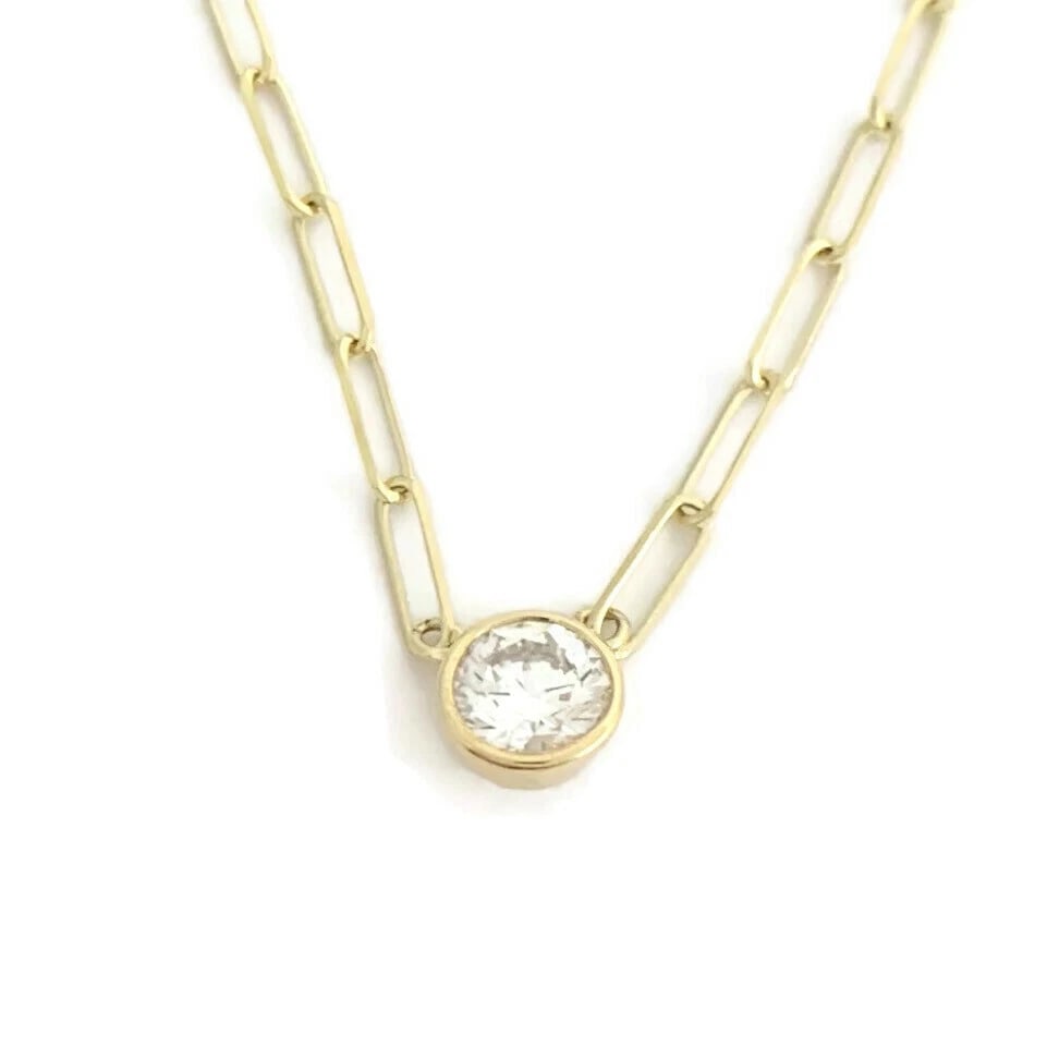 GIA Round Bezel Solitaire Diamond Paperclip Necklace 14K Yellow Gold .50 CT: Round Bezel Solitaire Diamond Pendant Paperclip Necklace 14K Yellow Gold .50 CT Make a statement with this beautiful necklace. Please let us know if you have any questions :) Diamonds: 1 round brillia