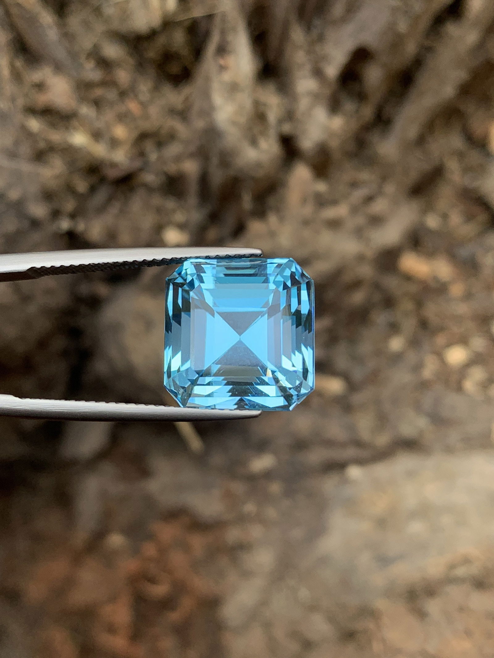 Swiss Blue Topaz Gemstone: Asscher Cut, 18.15 Carats: Title:Swiss Blue Topaz Gemstone: Asscher Cut, 18.15 Carats Description:Materials: Gemstone: Topaz Carat weight: 18.15 Swiss Blue Topaz Gemstone| Asscher Cut| Blue Color | Ring and Jewelry Size Topaz G