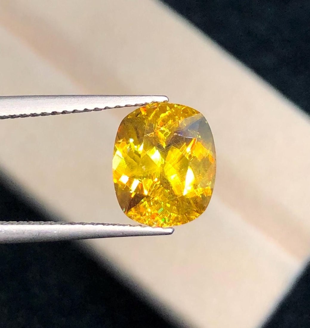 3.34 Carat Yellow Sphene Gemstone: Cushion Cut Titanite: Title:3.34 Carat Yellow Sphene Gemstone: Cushion Cut TitaniteDescription:Materials: Gemstone: Sphene Carat weight: 3.340 