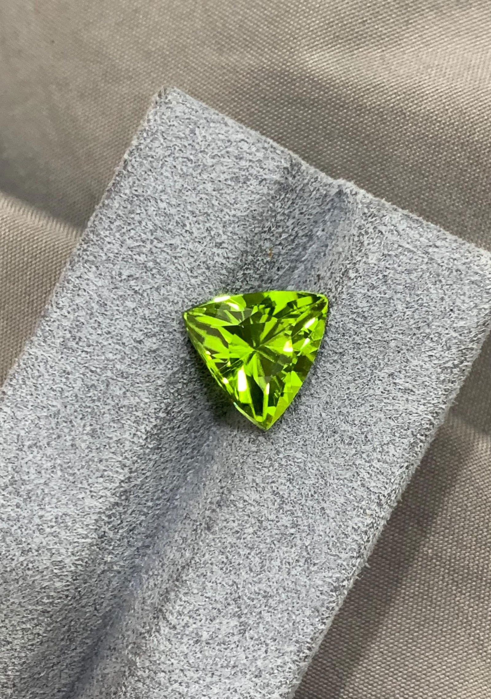 Deep Green Peridot Gemstone: 4.55 CT Trillion Cut, Sapat Mine - 4