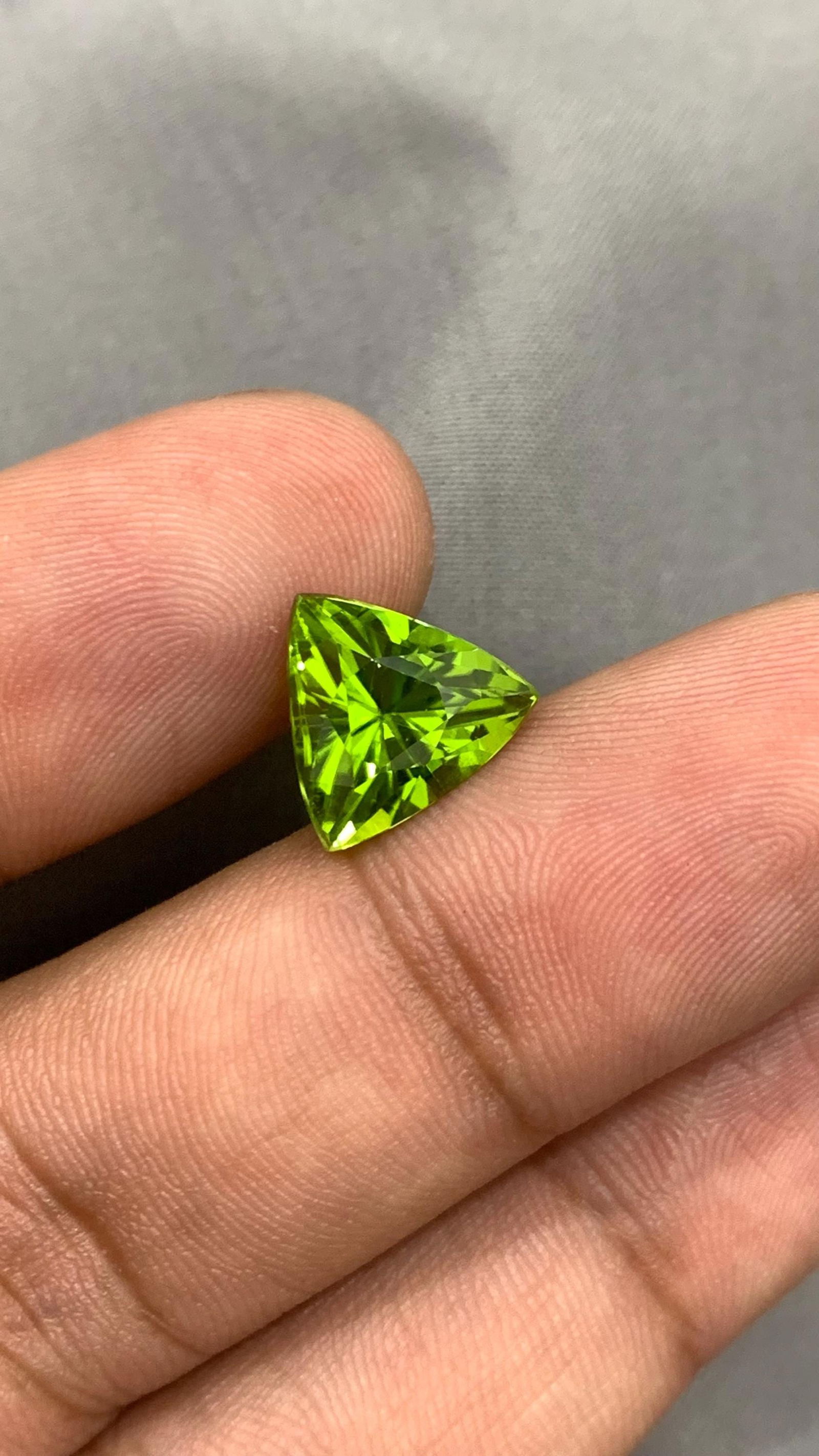 Deep Green Peridot Gemstone: 4.55 CT Trillion Cut, Sapat Mine - 6