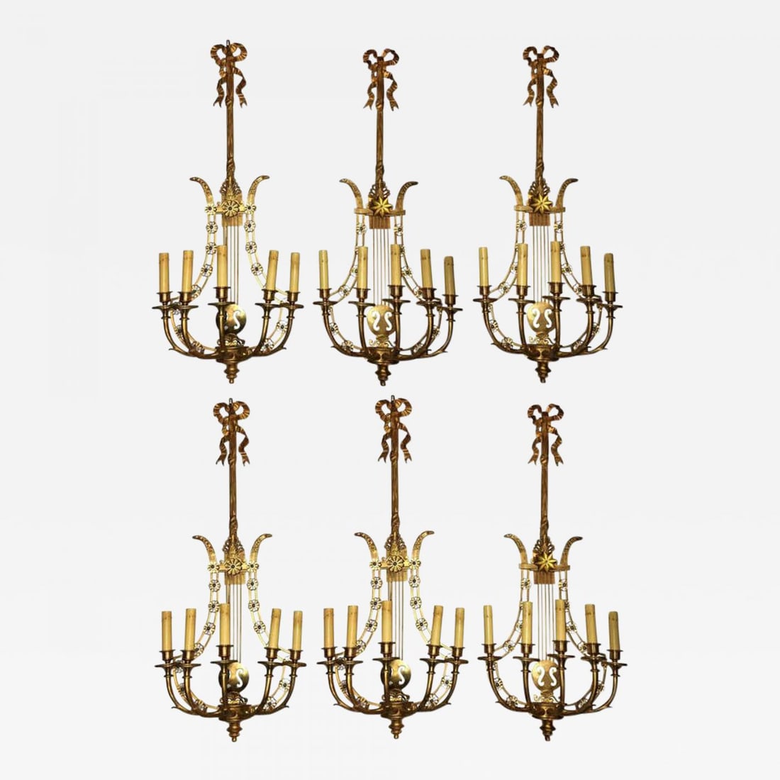 Louis XVI Style Harp / Lyre Back Bronze Wall Sconce. Set of Six: Group of six Louis XVI style harp back bronze wall sconce. This fine pair reminiscent of the Hollywood Regency era are all solid bronze. Each having a harp back design with crystal rosettes throughout