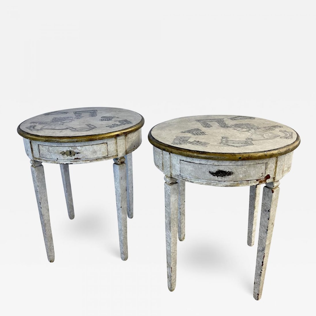 Gustavian Pair of End, Side Tables, Swedish Paint Decorated, Fornasetti Style: 18th/19th Century Gustavian Pair of End, Side Tables. The pair having been later hand pained in the Piero Fornasetti fashion. Each on sturdy bases of worn design this magnificently pair of painted tab