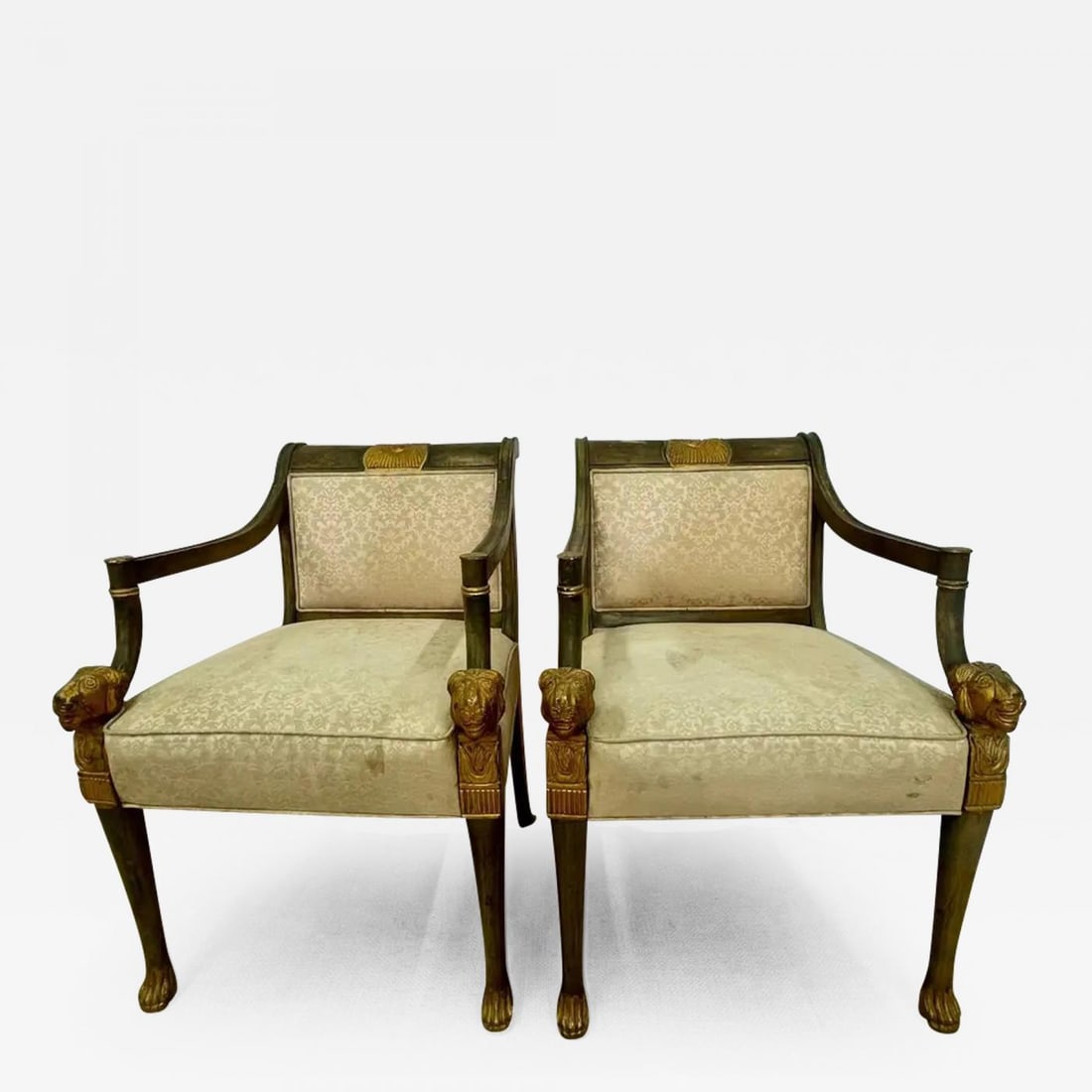 19th Century Swedish Neoclassical Arm Chairs, a Pair, Fauteuils, Europe, 19th C.: 19th century Swedish neoclassical arm chairs. A pair of finely carved parcel gilt and paint decorated arm chairs or fauteuils. Each having gilt claw feet with intricately detailed gilt lion heads at t