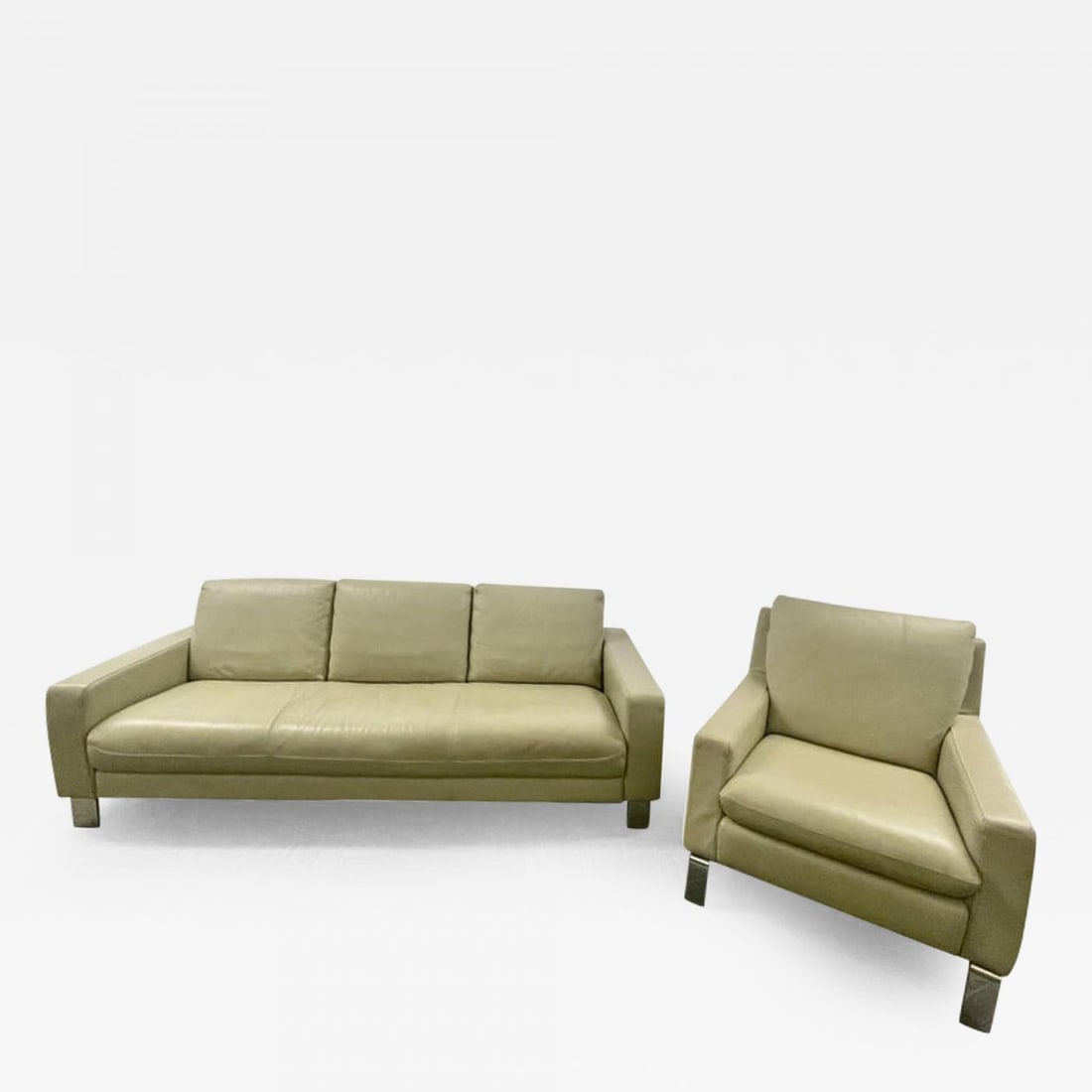 Mid-Century Modern Italian Leather Sofa and Chair by Nicoletti, Italy, 1970s: Mid-Century Modern Italian leather sofa and chair by Nicoletti, Italy, 1960s Three seater sofa and lounge chair set in a luxurious thick Italian pebble leather with comfortable seats on a stainless st