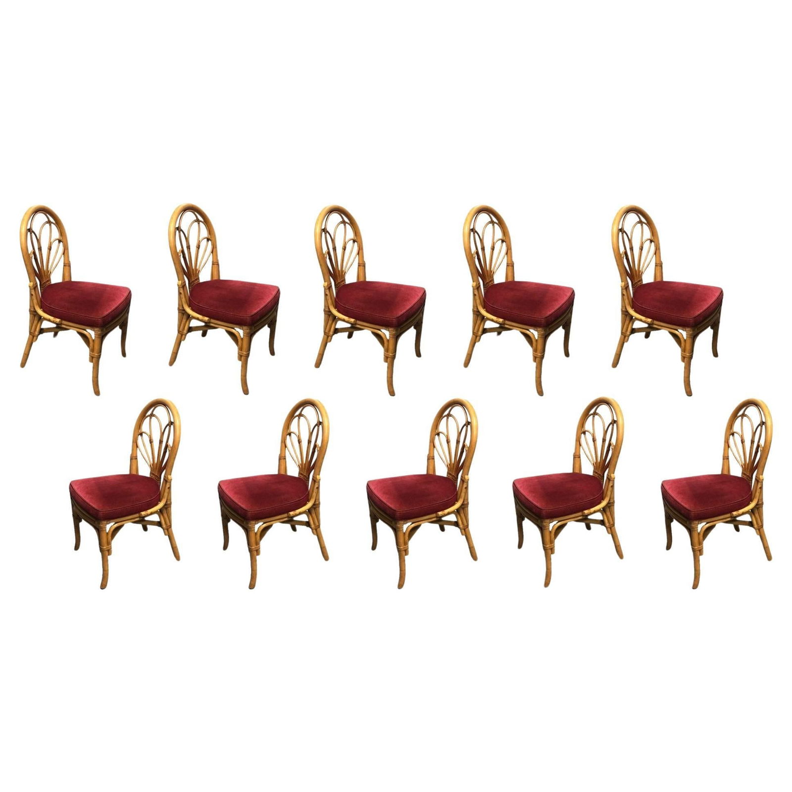 Restored Rattan Petal Fan Back Dining Chairs Set of 10: Discover the allure of vintage charm with our restored Paul Frankl-inspired rattan petal loop fan back dining chairs. Adorned in a dark red seat cushion, these chairs blend classic rattan intricacy wi