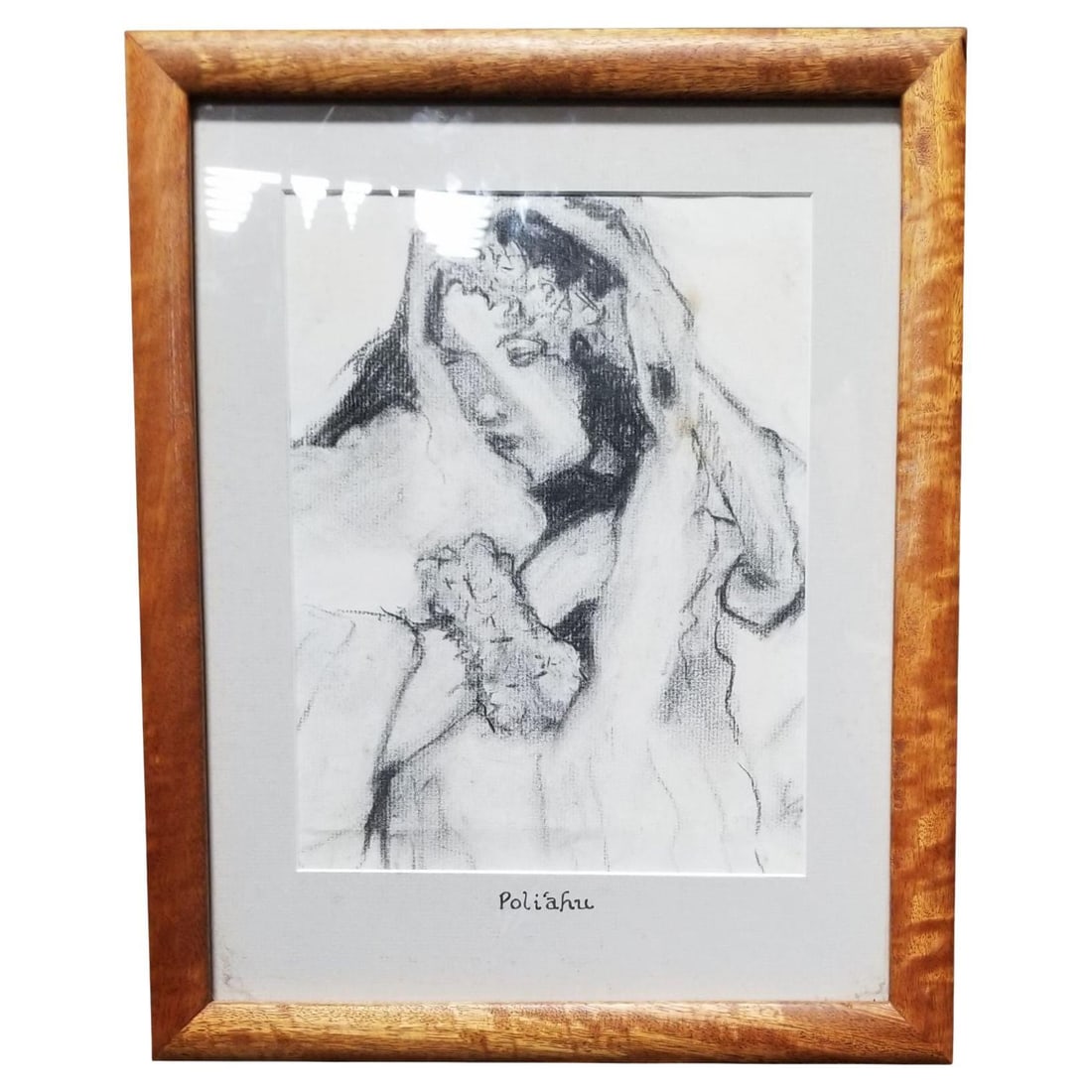 Hawaiian Female Portrait Charcoal on Paper Titled "Poliʻahu" in Koa Wood Frame: Female portrait charcoal drawling featuring Poliʻahu a prominent deity in Hawaiian mythology, revered as the goddess of snow, ice, and cold. She is one of the four goddesses associated with Mauna