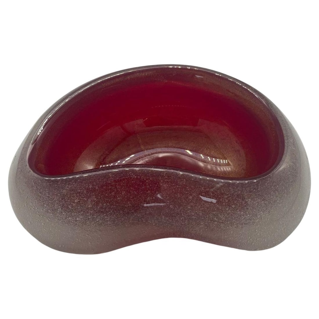 Handblown Cherry Red Biomorphic Kidney Murano Glass Ring Tray: Handblown cherry red biomorphic Murano glass ring tray featuring a bubble decorated clear exterior with a red glass interior. Italy, 1960 Reserve: $297.00br> Shipping:Domestic: Shipping rates