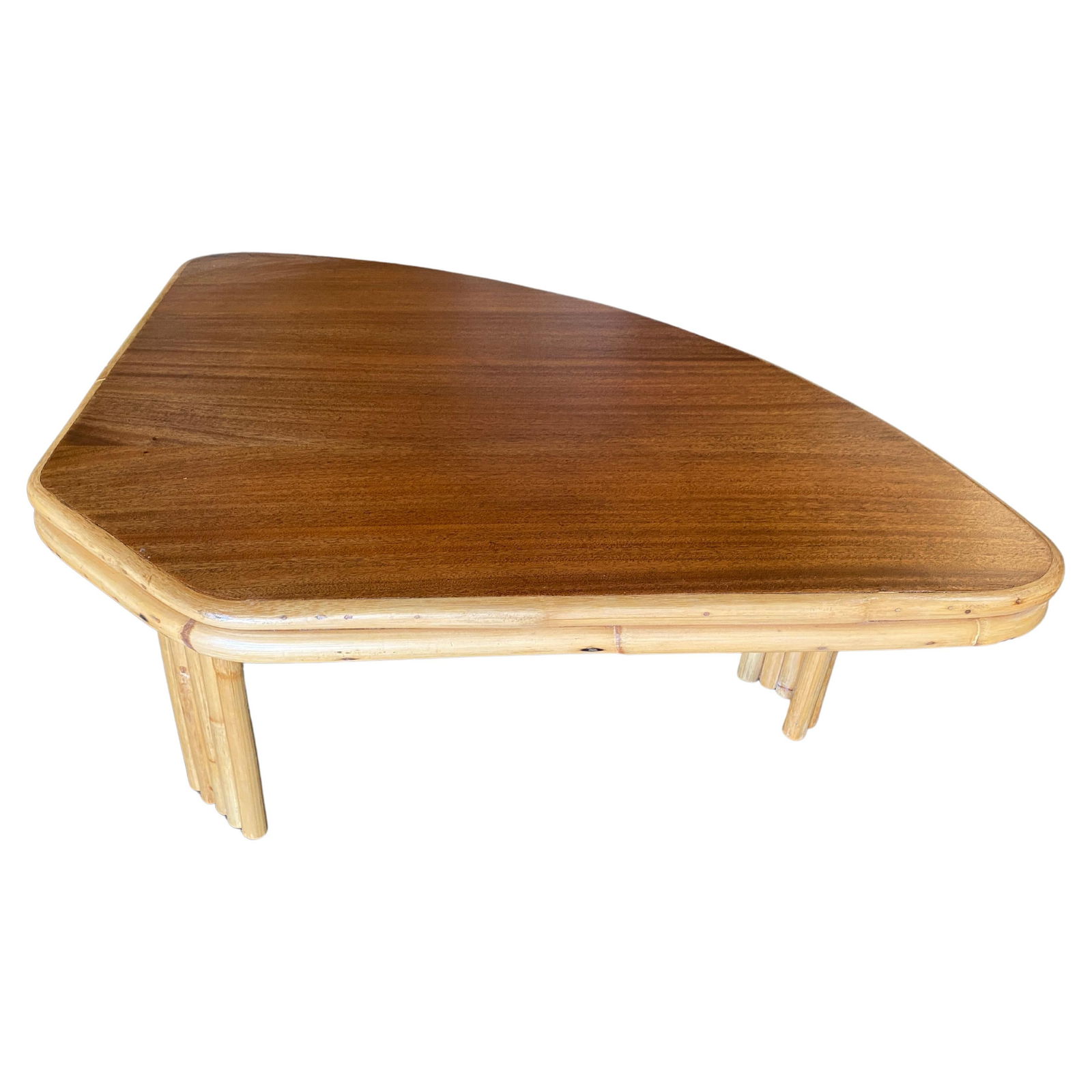 Restored "Pizza Slice" Rattan Side Table with Mahogany Top: Vintage 1940s two-tier rattan side table featuring stylized three-strand legs and beautiful half-round mahogany tops. 13 1/2" H x 46 1/2" W x 30 1/2 L Restored to new for you. We only purchase and