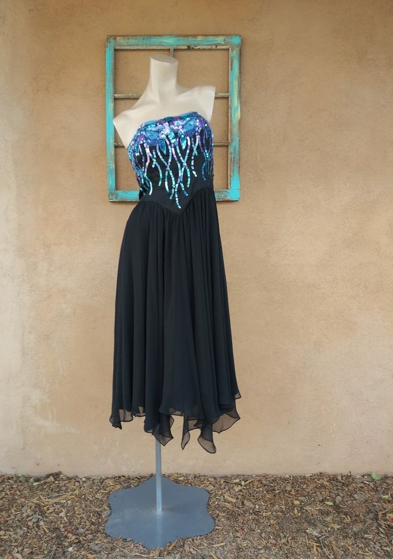 Vintage 1980s Strapless Sequin Dress Eletra Casadei Sz S M: Sequin and beaded bodice. Blues, purple. Black flowing skirt - chiffon over poly. Sawtooth, handkerchief hemline. Simple, glitzy and elegant. Late 1980s Size: Sz S-M, up to approx a US6. Check measure