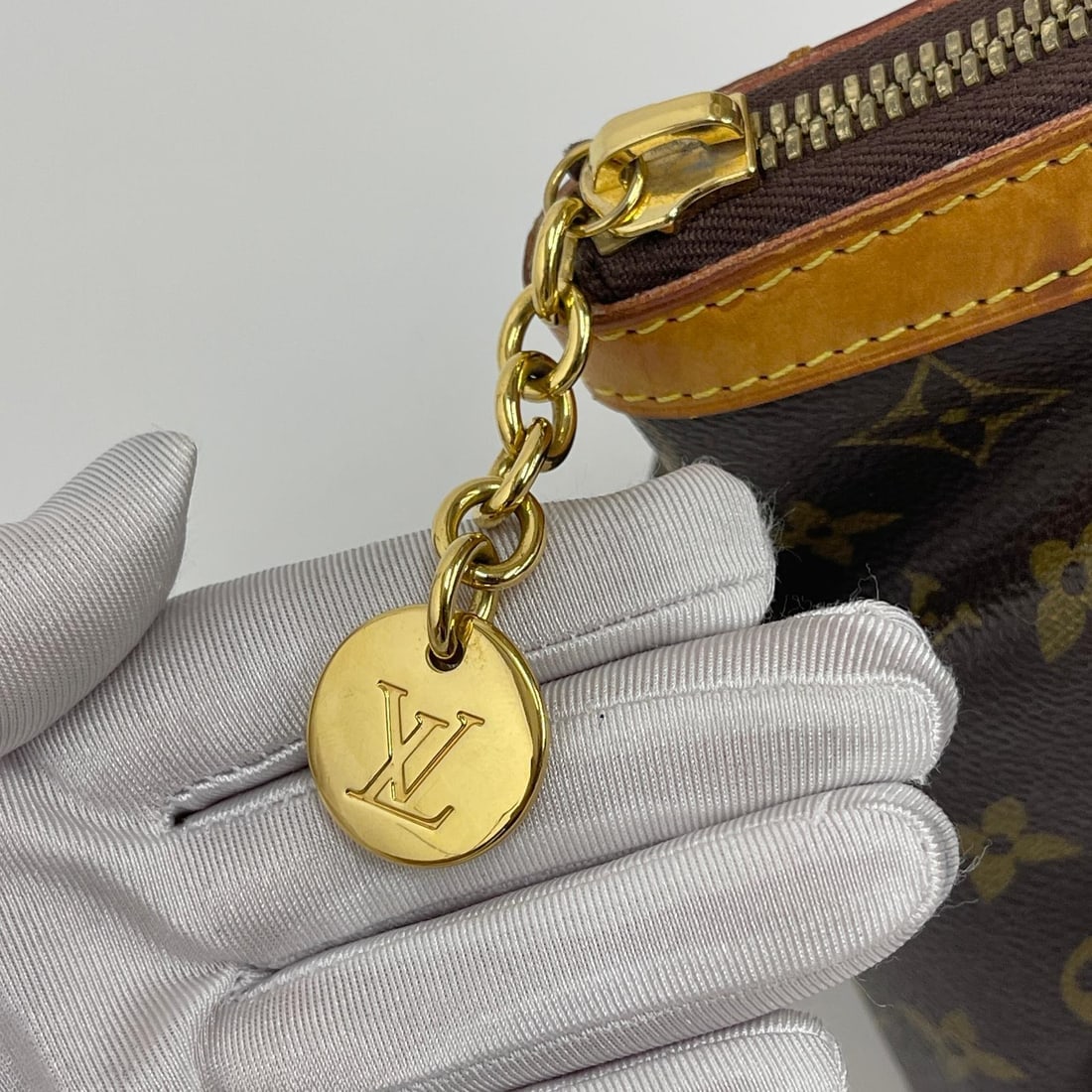 LOUIS VUITTON Tivoli PM Bag in Monogram Canvas - 9