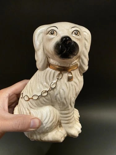 White Staffordshire Spaniel Dog Figurine: 8" Tall Roughly 1 pound Wonderful Reproduction Staffordshire Spaniel figurine Popular in England from the 18th century onward. These figurines, often produced in Staffordshire, are commonly modeled