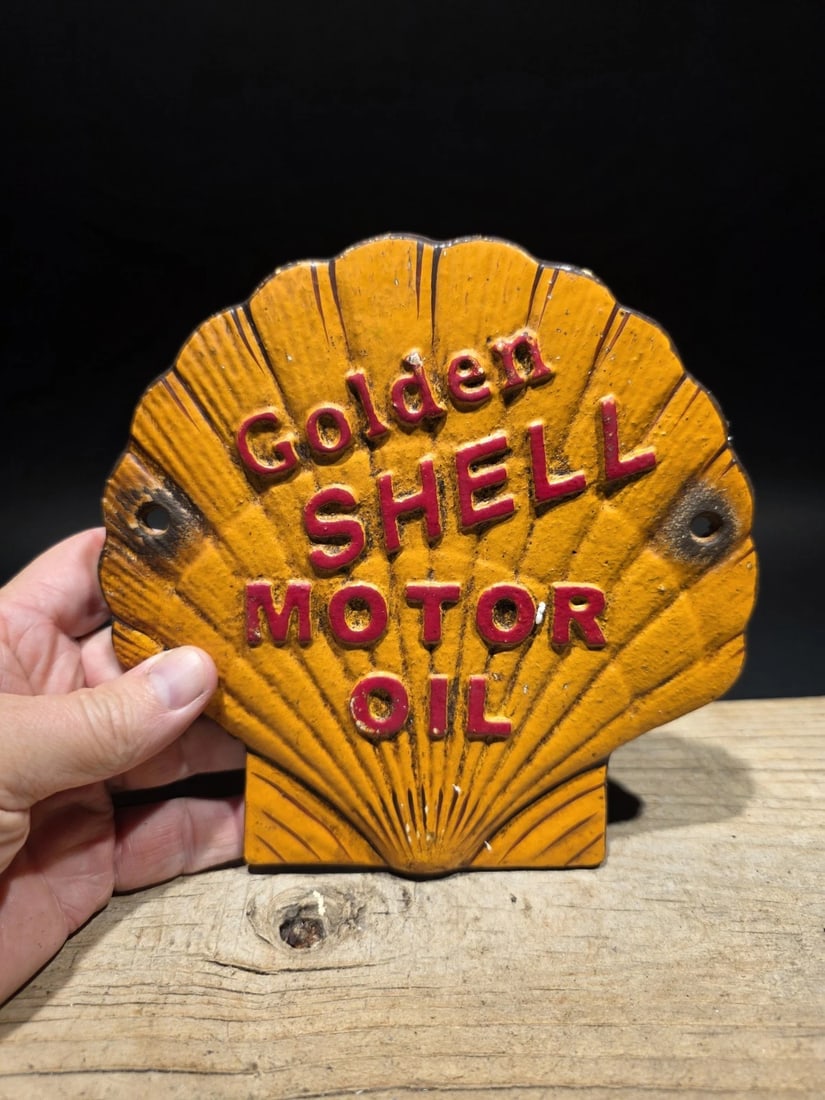 7" Cast Iron Golden Shell Oil Sign Plaque: 7" Wide Such a neat reproduction cast iron plaque/sign. This sign is all solid cast iron. Hand painted, wonderful signs of wear and distress. Hard to tell its age! Reserve: $40.00 