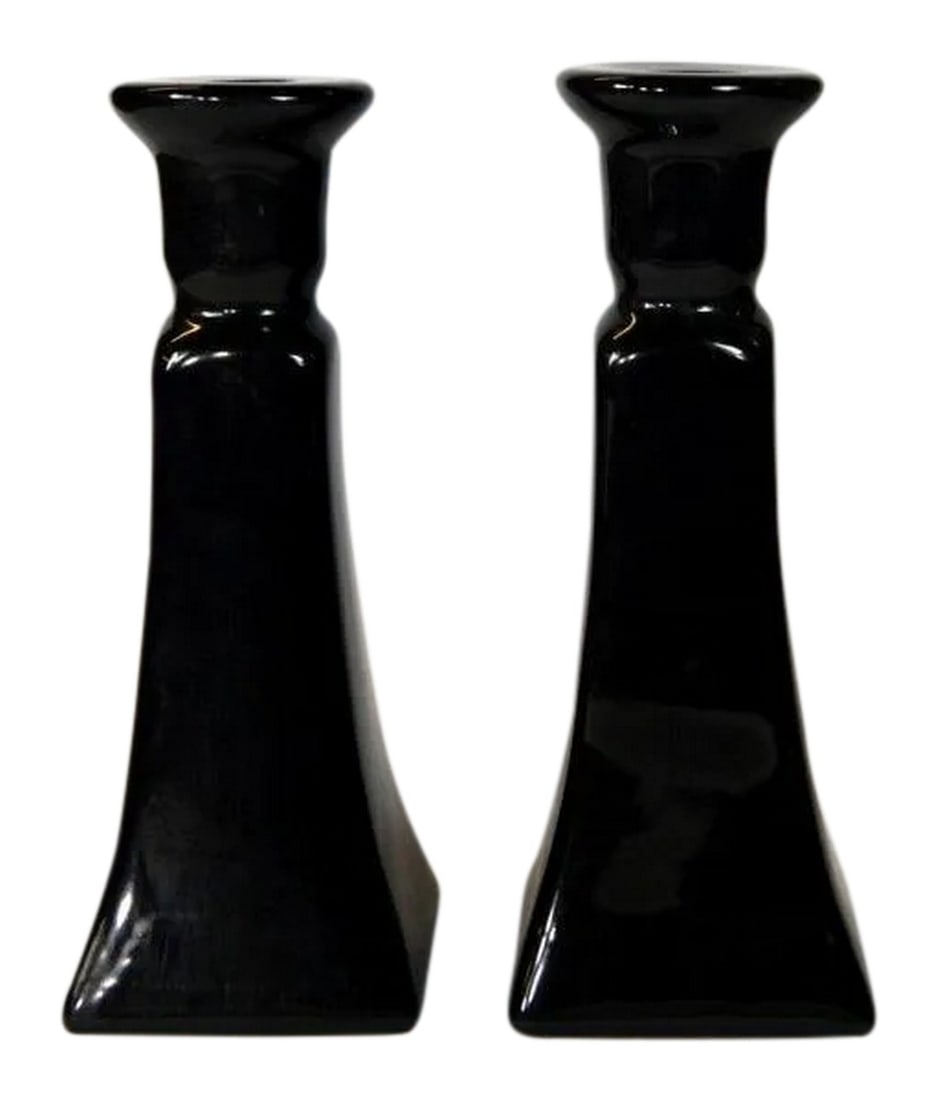 Black Porcelain Candle Holders - A Pair: A pair of black porcelain candle holders that look great with taper stick candles. Condition: Condition Notes: Excellent - Minor wear consistent with age and history Dimensions: Height: 8 in. Width: 3
