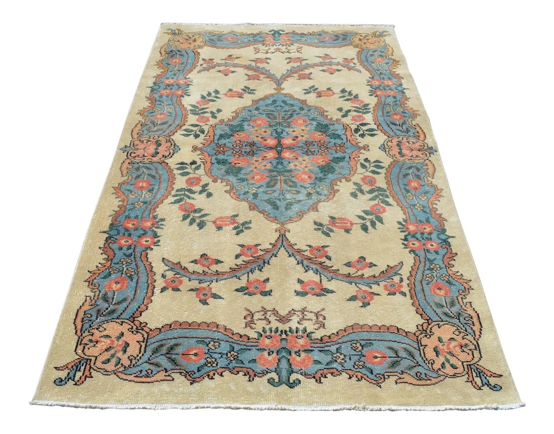 Vintage Turkish Hand Knotted Area Rug - 4'4"x 7': This is a beautiful vintage hand knotted distressed finish rug from turkey. It has bright primary colors on khaki field . This rug would be an easy to work with in just about any setting. Dimension: 5