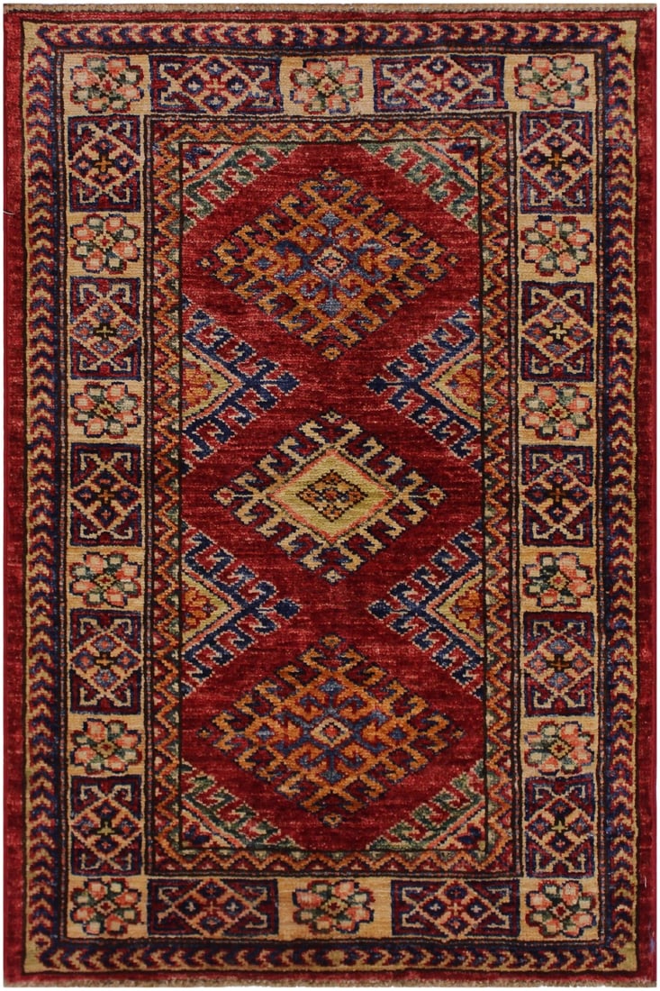 1990s Rustic Kazak Red/Beige Hand-Knotted Wool Rug - 2'0 X 2'10: Create a new dimension of style in your home with this breath-taking hand-knotted rug featuring incredible luxurious texture and appearance. This gorgeous hand-knotted rug by Persian master weavers fr