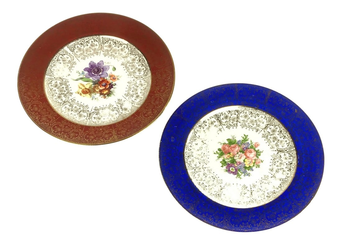 Red and Blue Border with Floral and 22k Gold Plates - a Pair: The Old Fashioned Charm of beautiful florals of roses in rich pink, deep rose, and violet, with green foliage, on a soft Vintage white background, trimmed with a 22 karat gold pattern bordering the ce