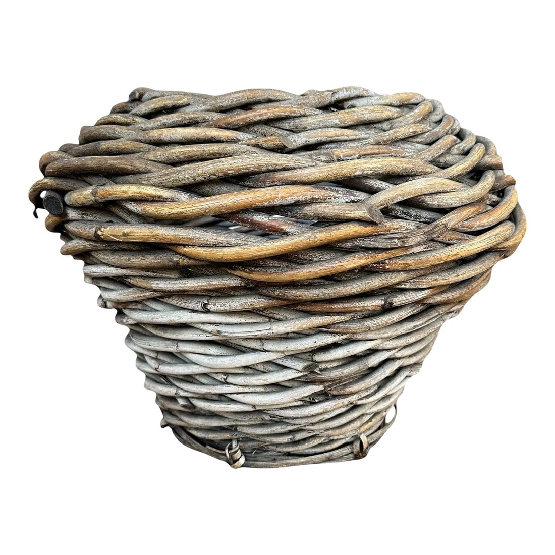 Antique Large Handwoven Rattan Split Reed Basket: Antique primitive hand woven large basket. Bi-cone shape showcasing naturally aged-patina loaded up on timeless character. Split reed bottom supports and hand-ties. Thick woven rattan
