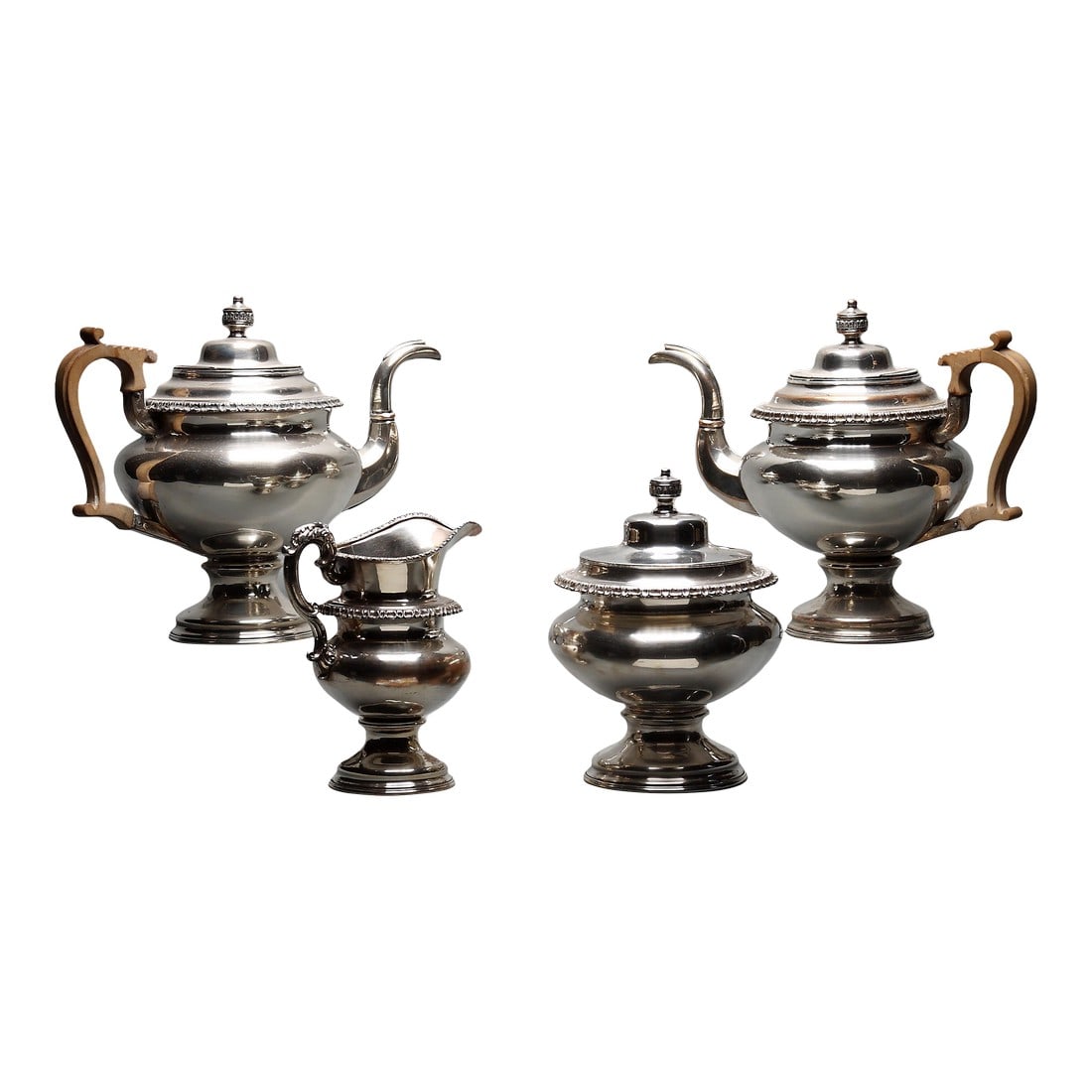 Early 19th Century Sheffield Plate Tea and Coffee Service, American- 4 Pieces: Coffee and Chocolate were both introcuced into England in the Mid-17th Century, and were to become an important part of social life, with more than four hundred coffee houses in London alone. The earl