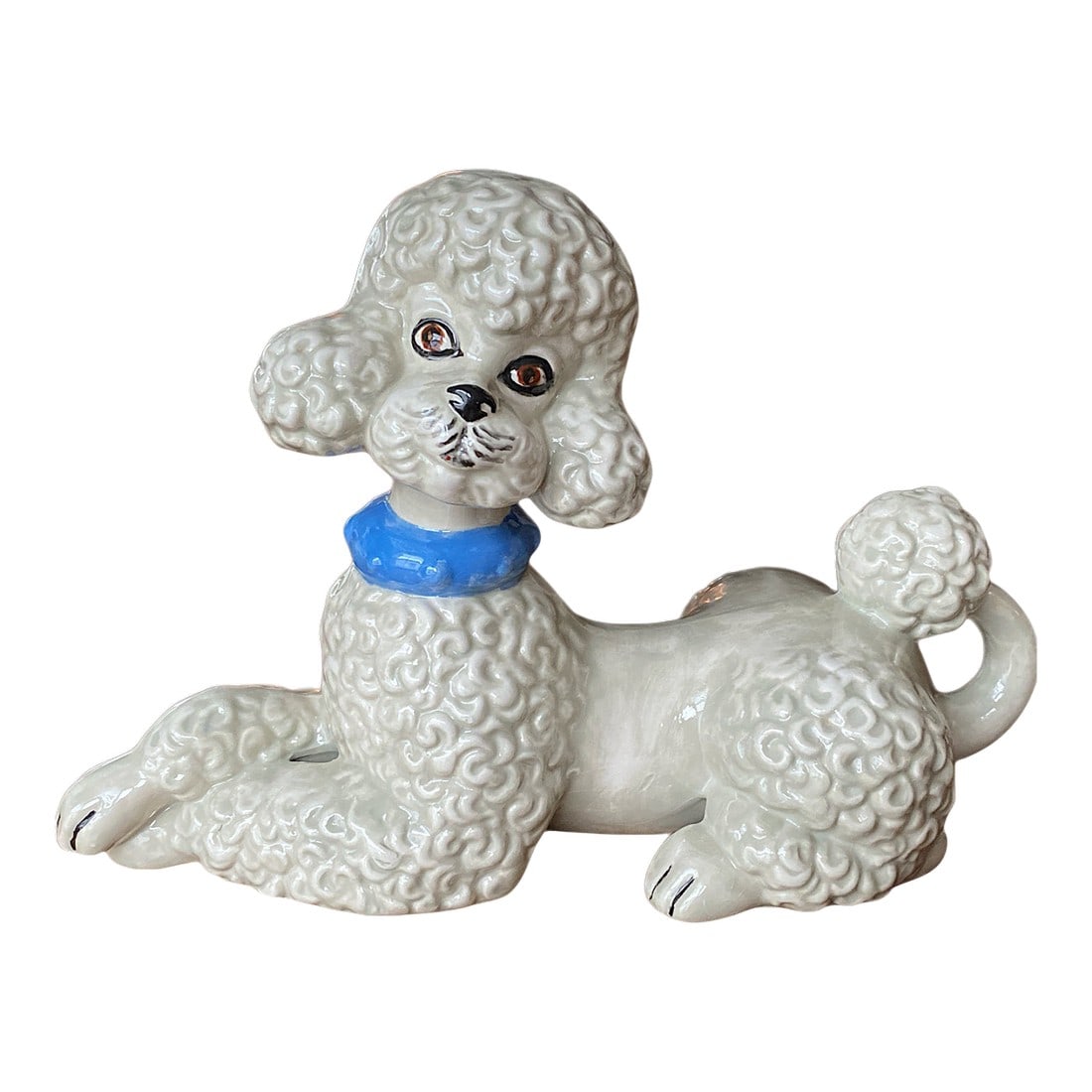 1950s Staffordshire Style Hand Painted Ceramic French Poodle Statue: Adorable, hand painted mid century french poodle in the Staffordshire style. Adorably cute face with expressive eyes and face, blue studded collar and coat with great, curly texture. Substantial at a