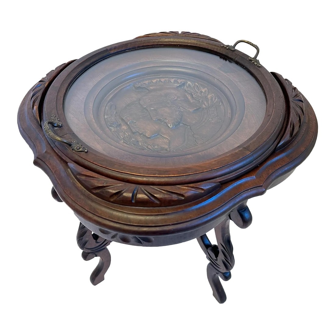 1920s Antique Victorian Dark Stain Carved Wood Tray Cocktail Table: Here is a beautiful antique wood tray table featuring carved Roman soldiers under a removable glass tray insert. This piece would be great for a small cocktail table or an end table at your favorite r