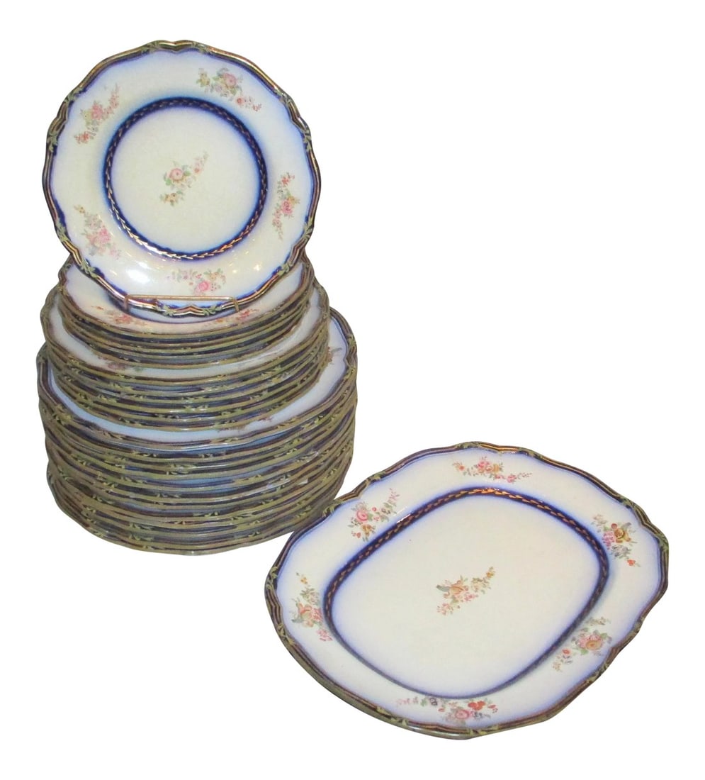 Vintage French Faience Dinnerware - 26 Pieces: French Faience set of 12 dinner plates, 6 salad plates, 6 side plates, and 2 serving platters. Made in the mid-1950s'. They are all in good shape ( noted hairline crack to edge of one platter, photos