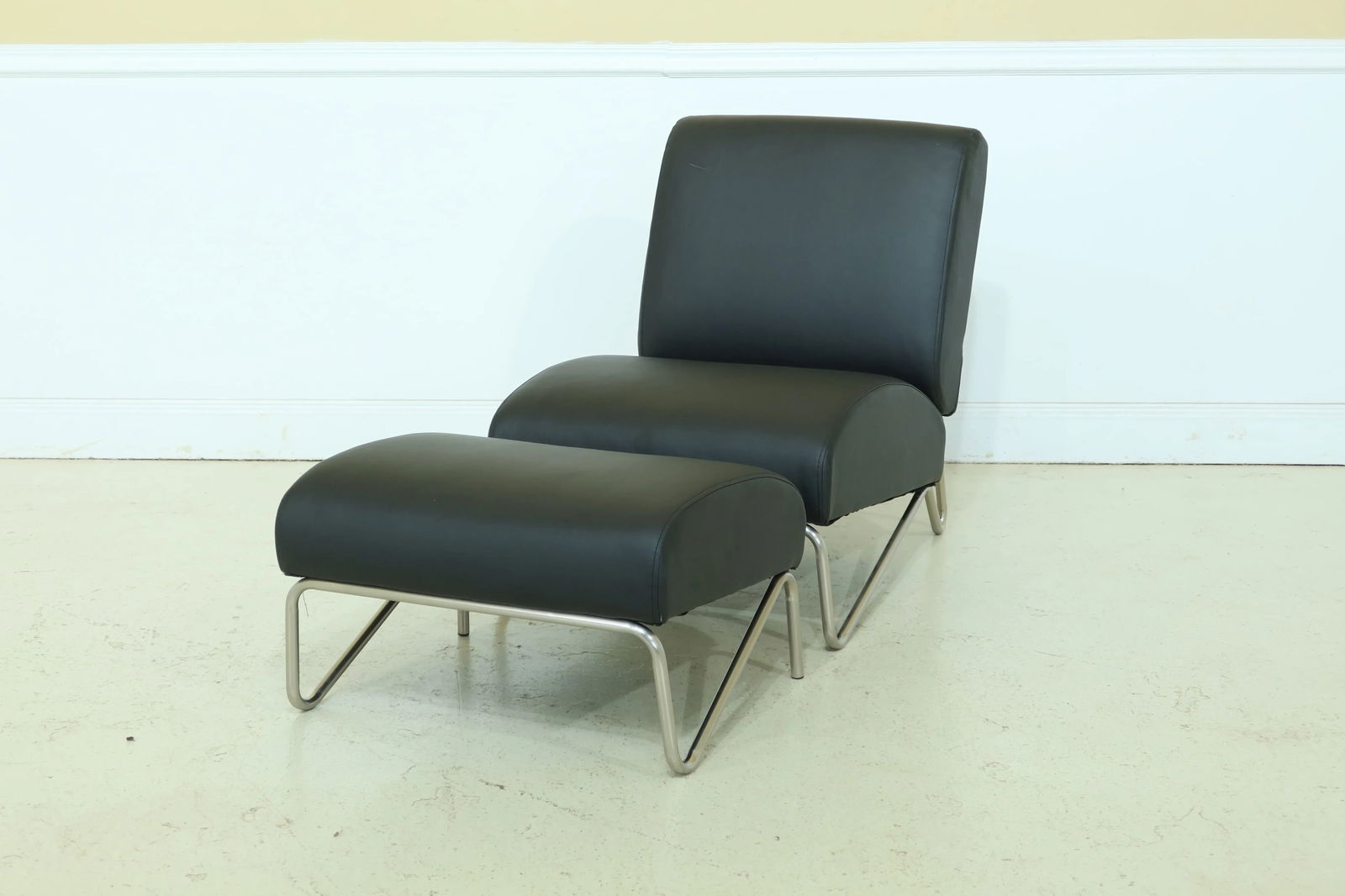 Directions East Modern Black & Chrome Chair & Ottoman - 10