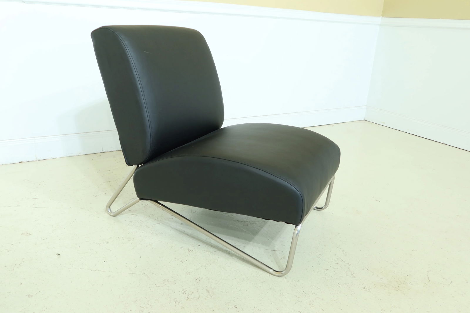 Directions East Modern Black & Chrome Chair & Ottoman - 4
