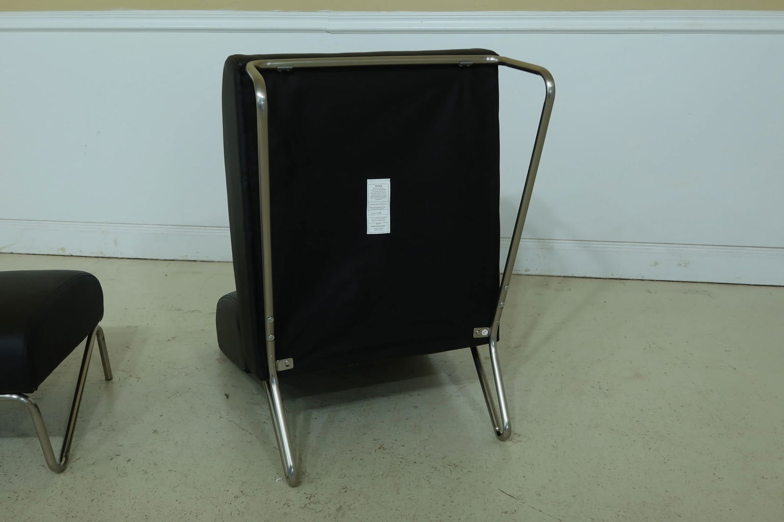 Directions East Modern Black & Chrome Chair & Ottoman - 8