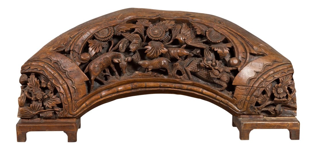 Mid 20th Century Chinese Hand Carved Wooden Floral & Animal Arching Sculpture: A Chinese vintage hand carved wooden floral and animal carving from the mid-20th century, with arched silhouette. Handcrafted in China and mounted on a custom base, this wooden sculpture depicts