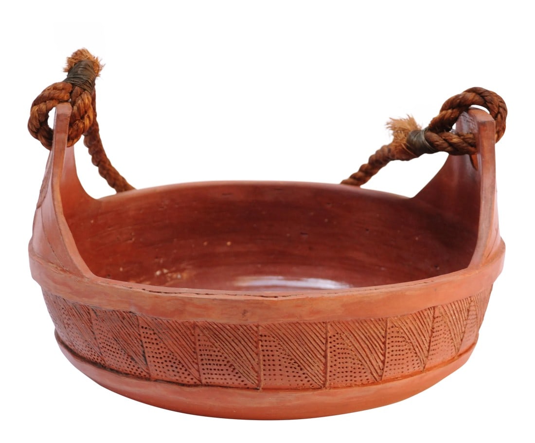 Studio Ceramic Terracotta Basket / Bowl With Woven Handle: Circa 1970s American terracotta bowl / basket with incised linear details and a woven rope handle. Very fine, vintage condition with no losses. H: 6.25" x Diameter: 10" Internal Note: P79 Condition: A
