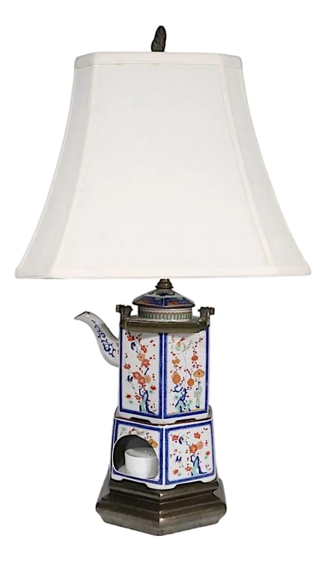 Japanese Porcelain Teapot and Warmer From the Toscany Collection Mounted as a Lamp: Decorative porcelain hand painted teapot, and warmer, mounted as a lamp. From the Toscany collection, made in Japan, late 20th C. This charming piece is in excellent, clean, working and ready to use c