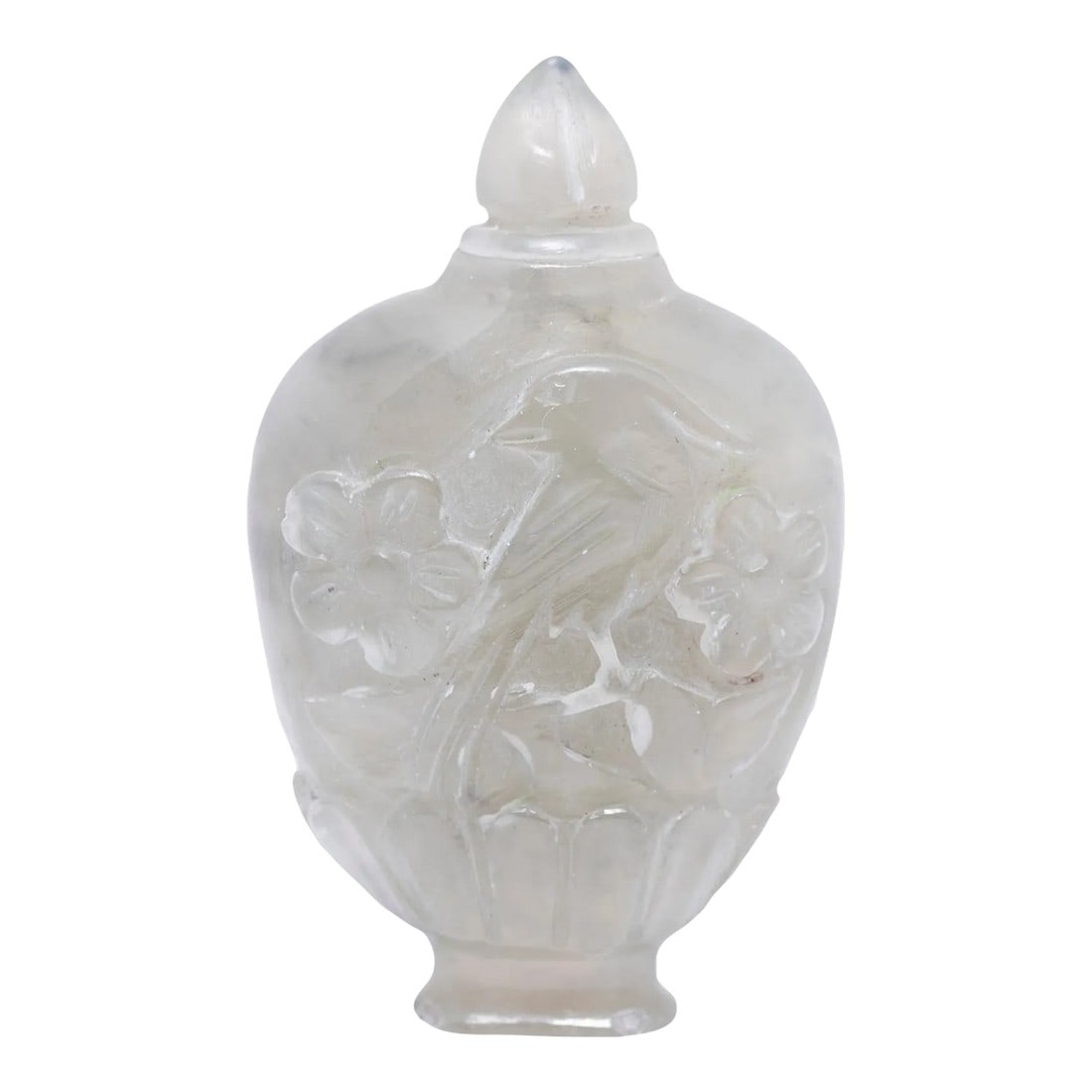 Grey Jade Snuff Bottle: A mixture of finely powdered tobacco, herbs, and spices, snuff was introduced to China in the 17th century by Western diplomats. Initially reserved for ranking members of Qing-dynasty society, the pra