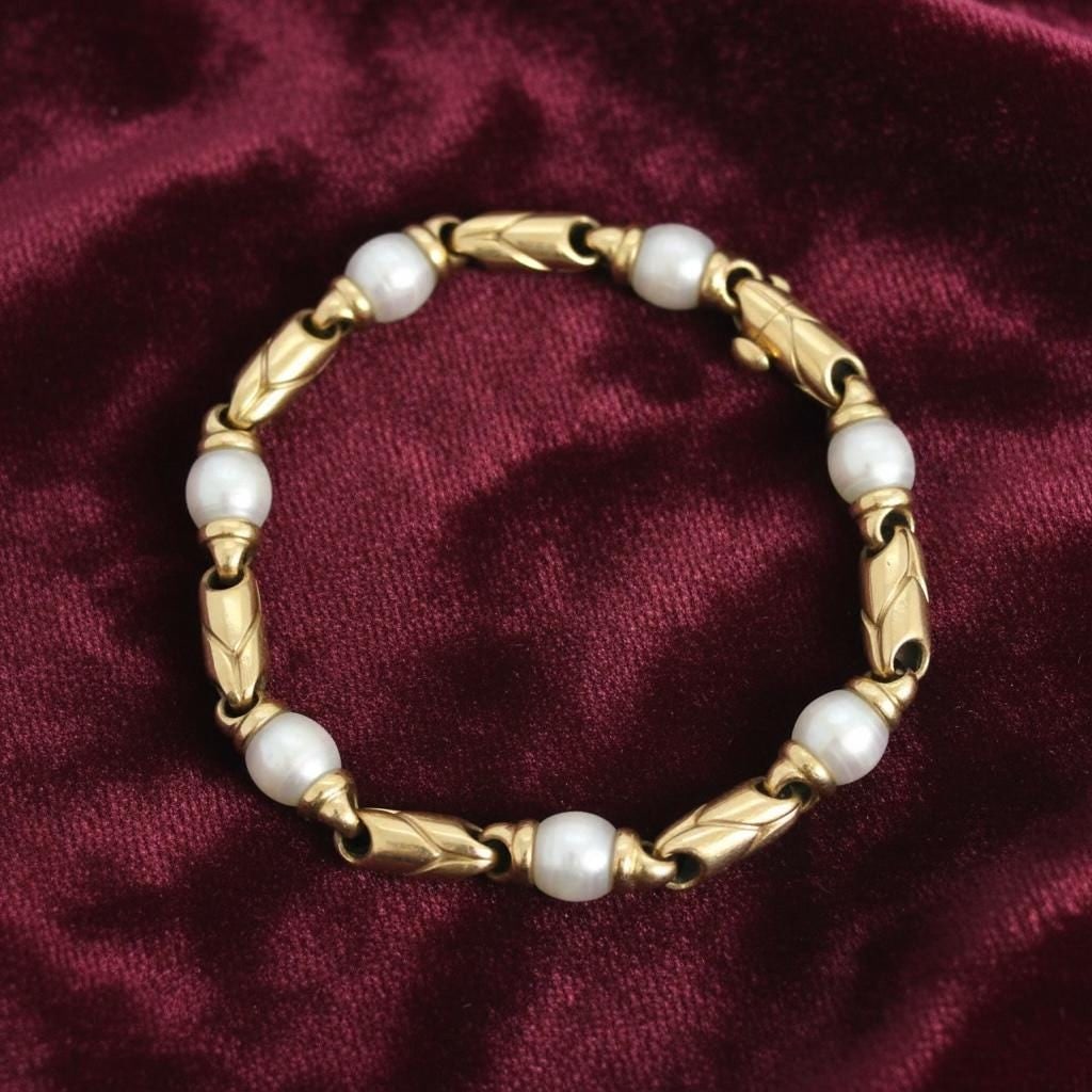 Bvlgari Passo Doppio 18k yellow gold seven piece pearl bracelet: Title: Bvlgari Passo Doppio 18k yellow gold seven piece pearl bracelet Description: 18k yellow gold Bvlgari Passo Doppio 7 piece pearl bracelet Reserve: $6,500.00 Shipping: Domestic: Flat-rate&#
