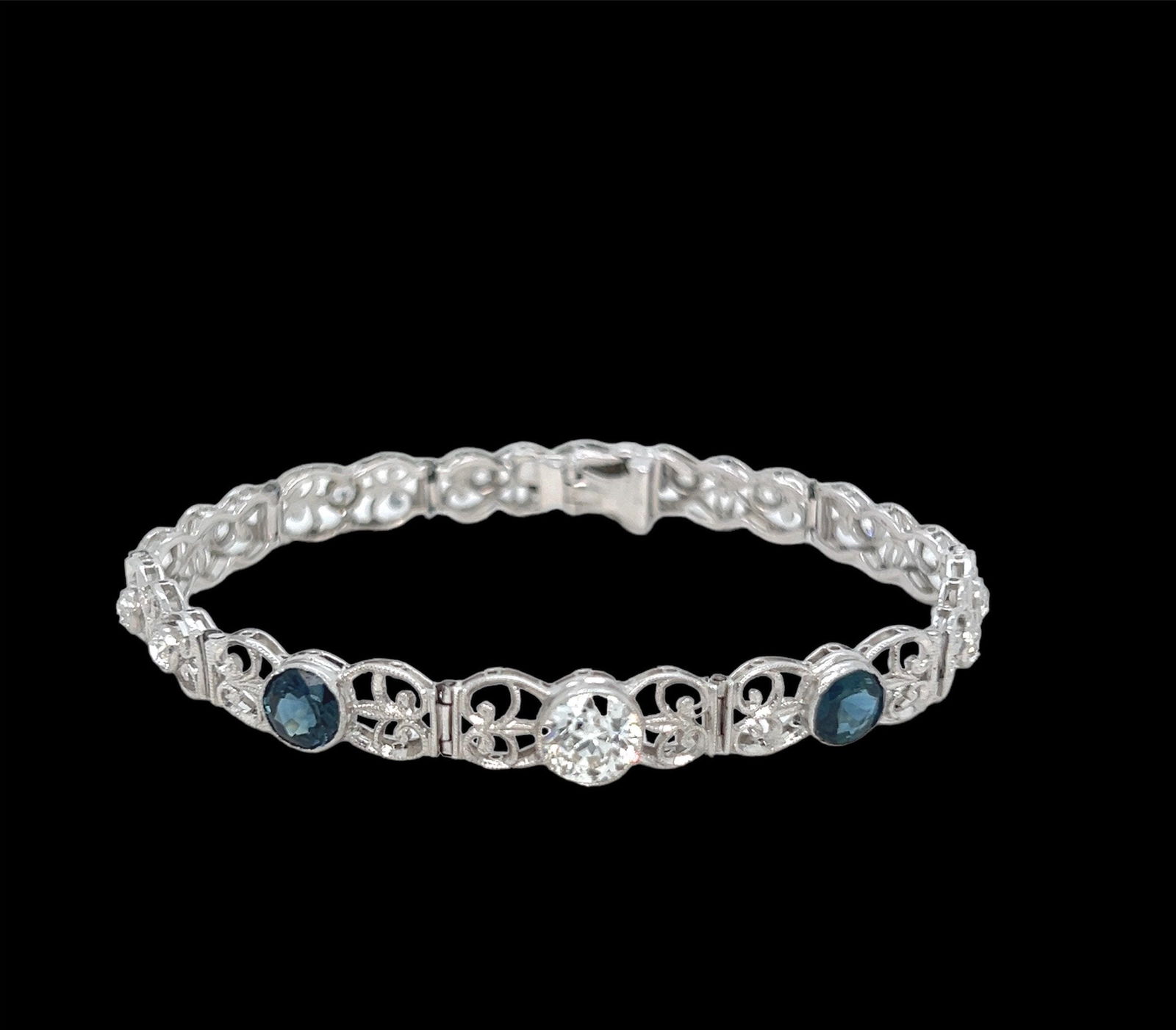 Antique platinum diamond sapphire filigree bracelet Just Reduced !!!: Title: Antique platinum diamond sapphire filigree bracelet Just Reduced !!! Description: Antique platinum diamond sapphire filigree bracelet with approximately 1.15ct old minor HVS2 with two matching