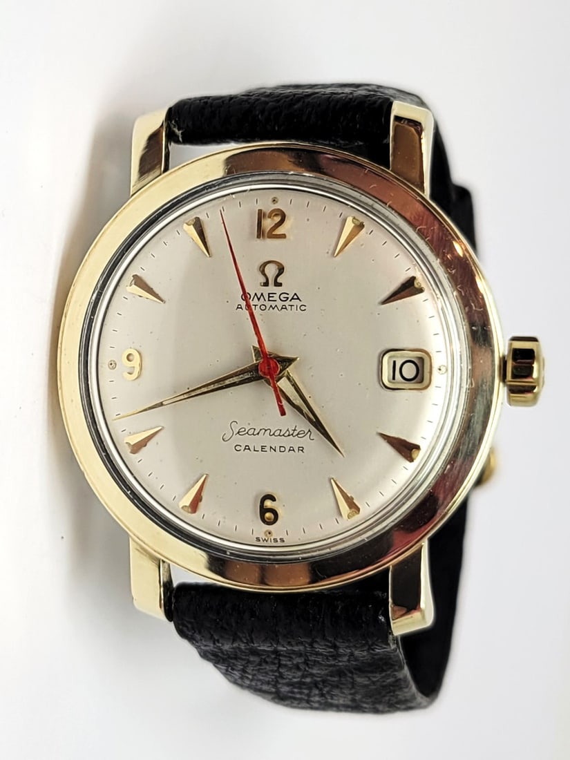 Vintage Mens 10k GF OMEGA SEAMASTER CALENDAR Automatic Watch Cal 502 KX60828: Vintage Men's 10k GF OMEGA SEAMASTER CALENDAR Automatic Watch Cal 502 KX60828 This Men's Omega watch is Swiss made. Great present for yourself or someone you love as well as for vintage collectors or