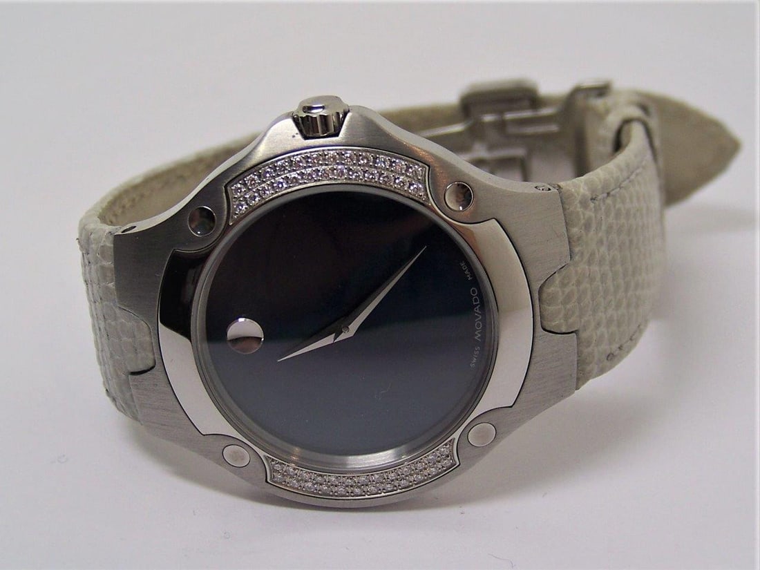 S/Steel MOVADO SPORTS EDITION Ladies Watch Ref 84 G1 1892 S with Diamonds: S/Steel MOVADO SPORTS EDITION Ladies Watch Ref 84 G1 1892 S with Diamonds This ladies Movado watch is Swiss made. Great present for yourself or someone you love! * Model # 84-G1-1892 S * Stainless ste