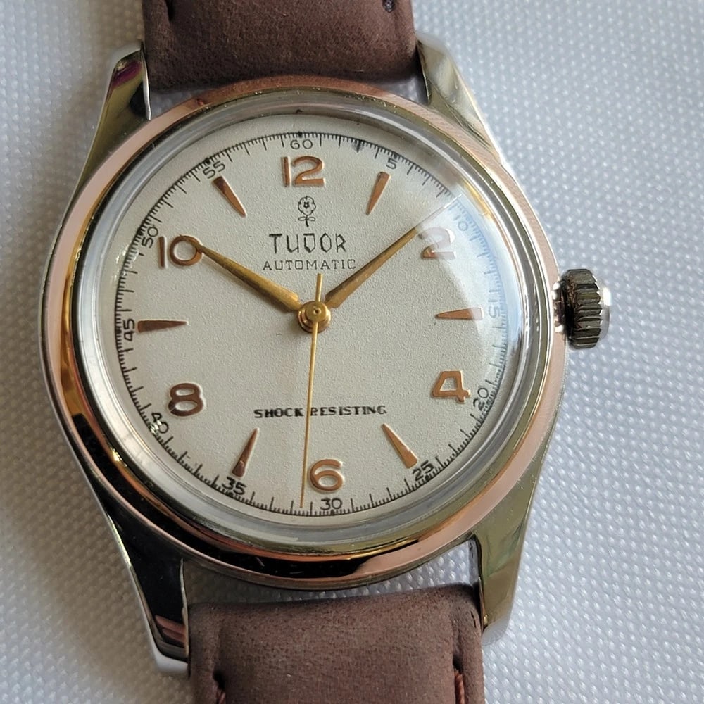 Tudor Ref 951 Rose Gold Bezel 34mm 1950s Mens Vintage Bumper Automatic RA645: Title:Tudor Ref 951 Rose Gold Bezel 34mm 1950s Mens Vintage Bumper Automatic RA645Description:Classic luxury, Men's Tudor Ref.951 bumper automatic with solid rose gold bezel, c.1950s, in excellent