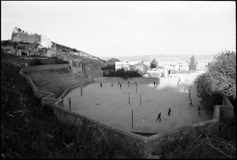 Football, The Merinid, Fes, Morocco - Silver Gelatin: Title: Football, The Merinid, Fes, Morocco - Silver Gelatin Description: Title: Football, The Merinid, Fes, Morocco - Silver Gelatin Photograph - Limited Edition of 10 Artist: Paul Cooklin Origin: Uni