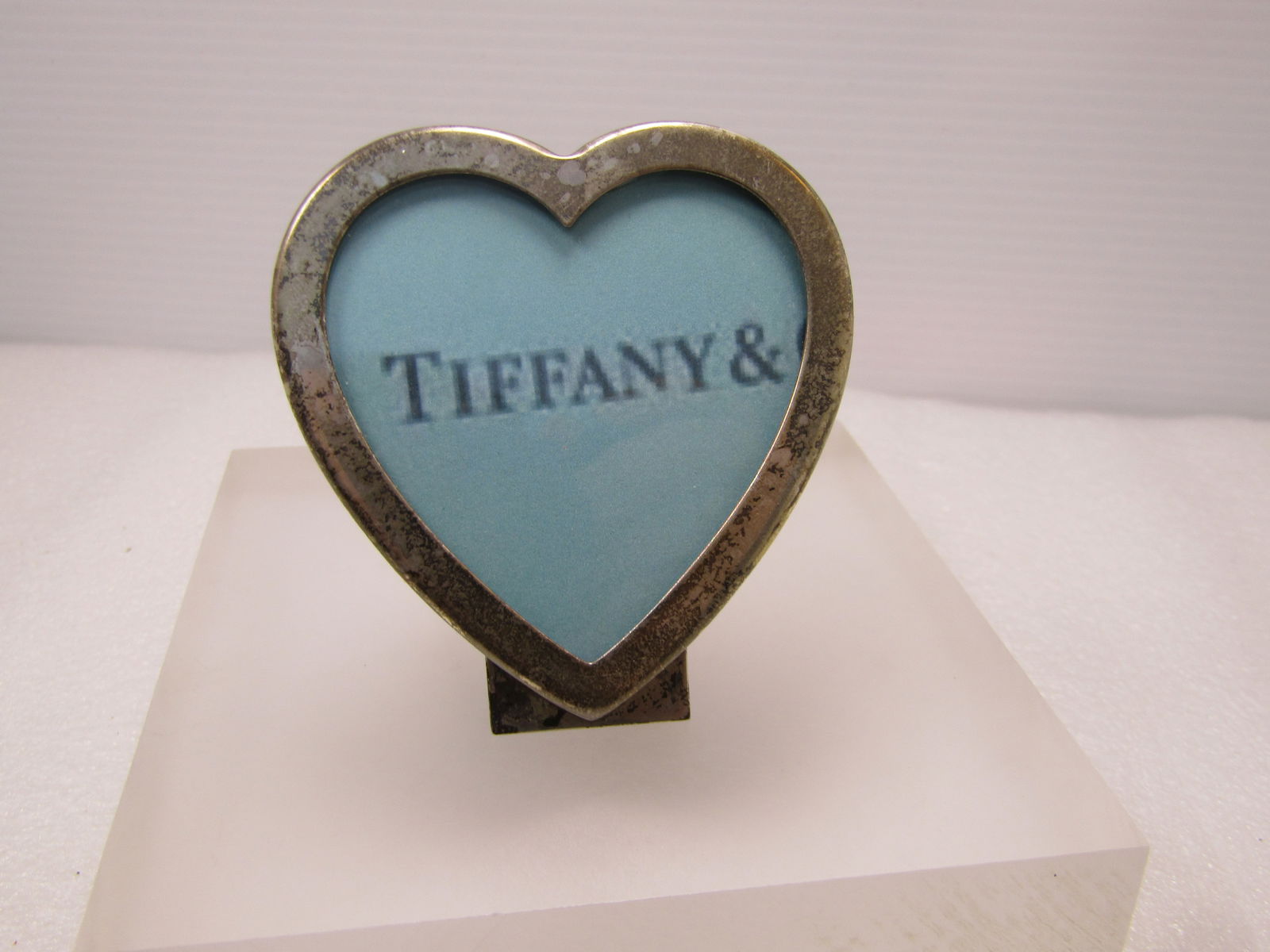 Vintage Tiffany Sterling Heart Easle Frame, 1970's-1980's: Vintage Tiffany Sterling Heart Easle Frame, 1970's-1980's estimated age. The owner of this copied the Tiffany name on the blue colored paper Tiffany is known for when trying to sell it. I purchased th