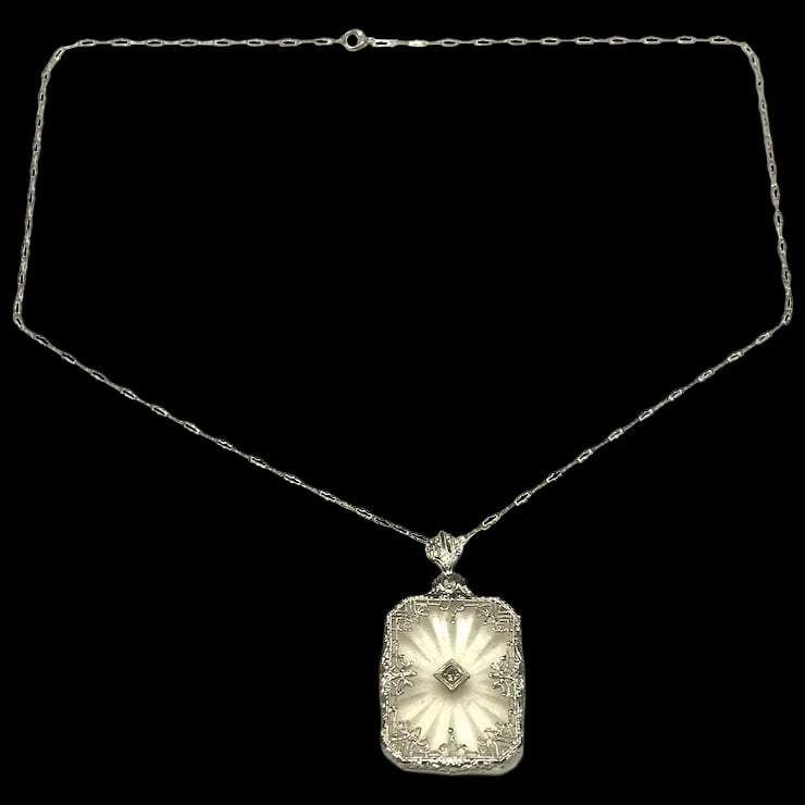 Art Deco 14k Filigree Camphor Glass and Diamond Necklace: Title: Art Deco 14k Filigree Camphor Glass and Diamond Necklace Description: Art Deco 14k Filigree Camphor Glass and Diamond NecklaceHallmarked: 14kWeighs 4.7 gramsDiamond Center Stone Approx. .05 car