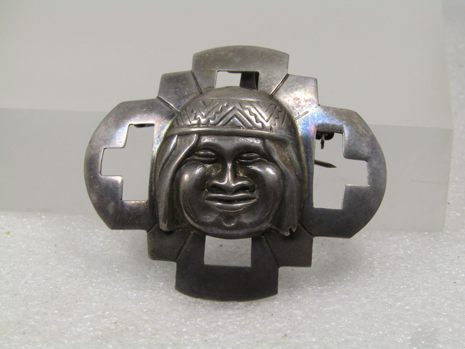 Vintage Sterling Peru Chakana Male Figural Brooch/Pendant, Signed AS, 1960's-1970's: Vintage Sterling Peru Chakana Male Figural Brooch/Pendant, Signed AS, 1960's-1970's The Chakana means cross in Incan - this has a domed cut-out cross shape with a male face on the front with long hair