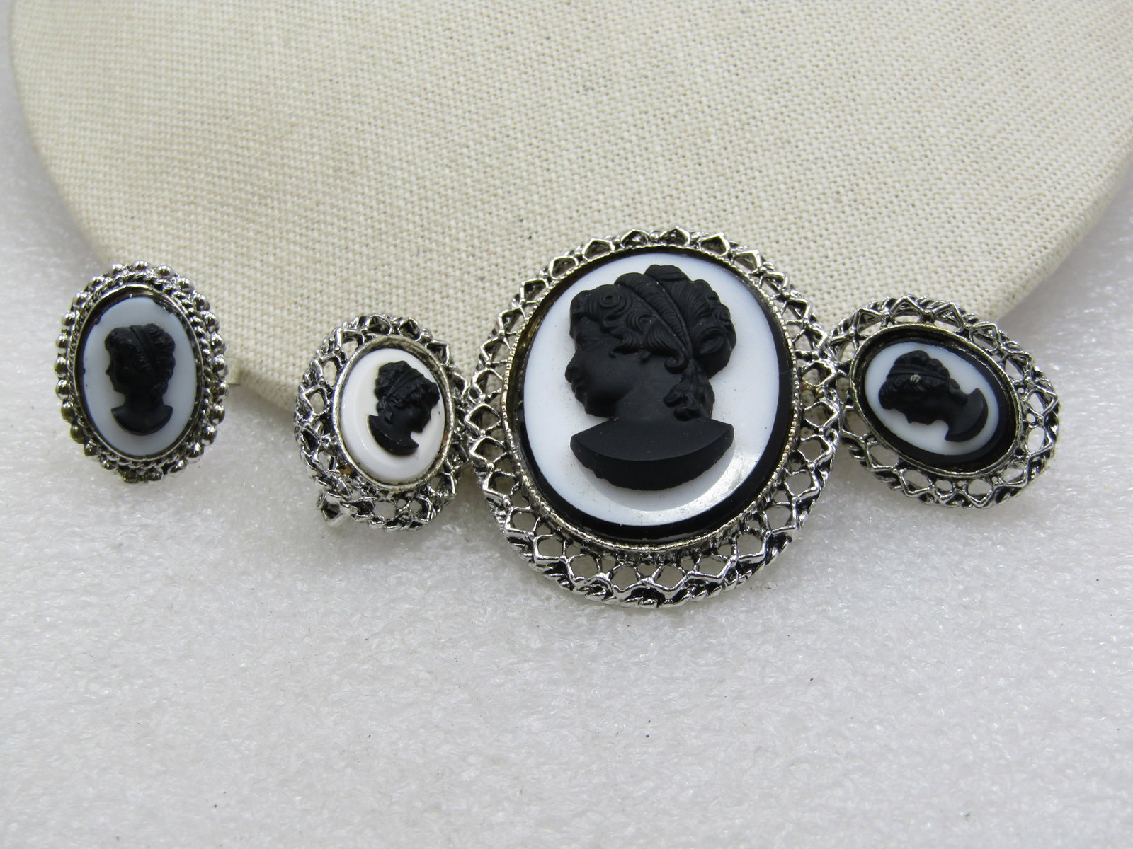 Vntage Cameo Brooch/Pendant, Earrings & Ring Set, Black/White, 1960's-1970's: Vntage Cameo Brooch/Pendant, Earrings & Ring Set, Black/White, 1960's-1970's. The brooch/pendant is 2" by 1.5" an can be worn as either a pendant or brooch. There are oval matching earrings with clip