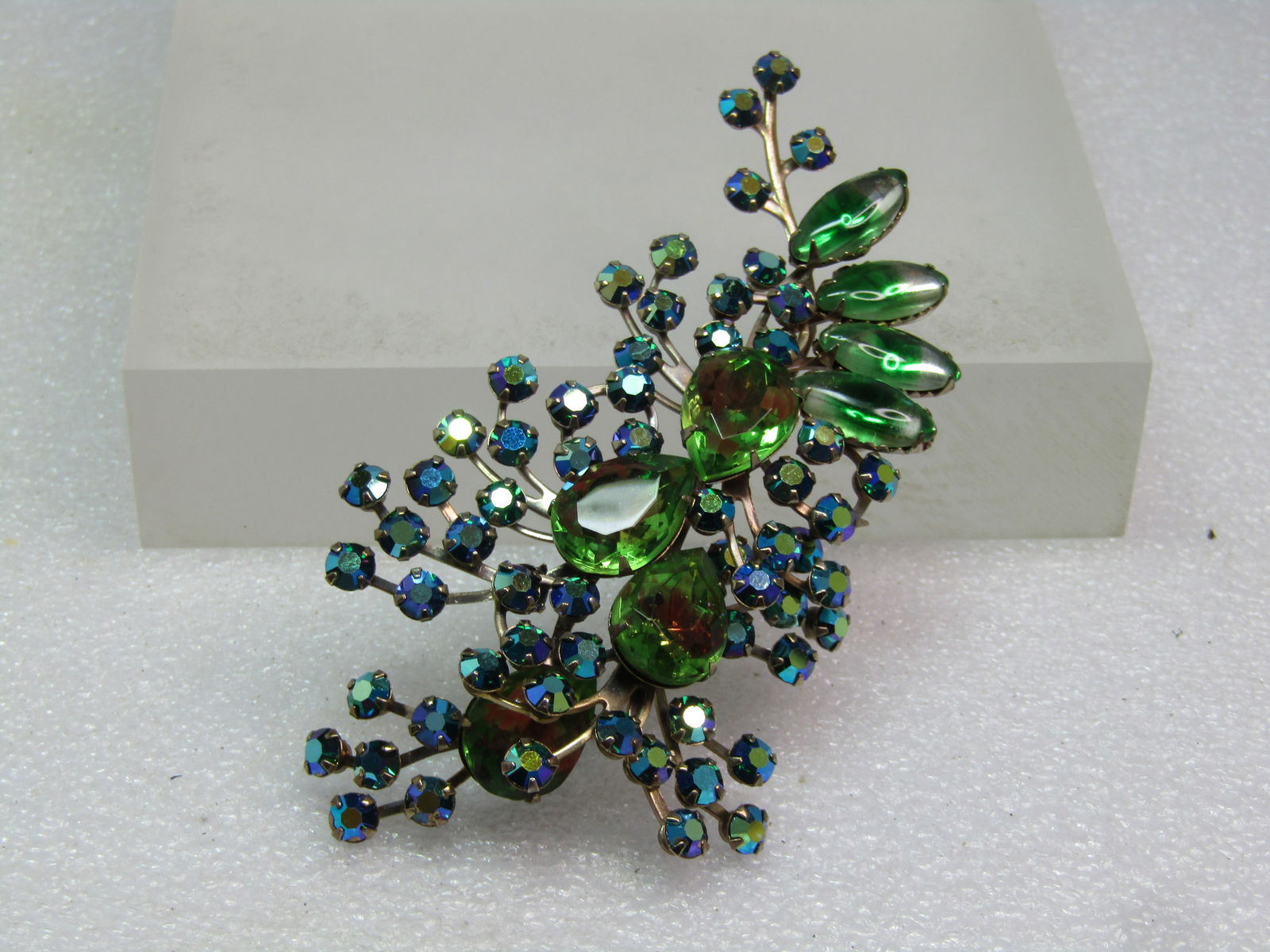 Vintage Green/Peacock Mixed Rhinestone Brooch, 1950's-1960's: Vintage Green/Peacock Mixed Rhinestone Brooch, 1950's-1960's. Aurora Borealis, This does not have a pinback - nor can I see where one would have been on this. A pinback could be soldered to the