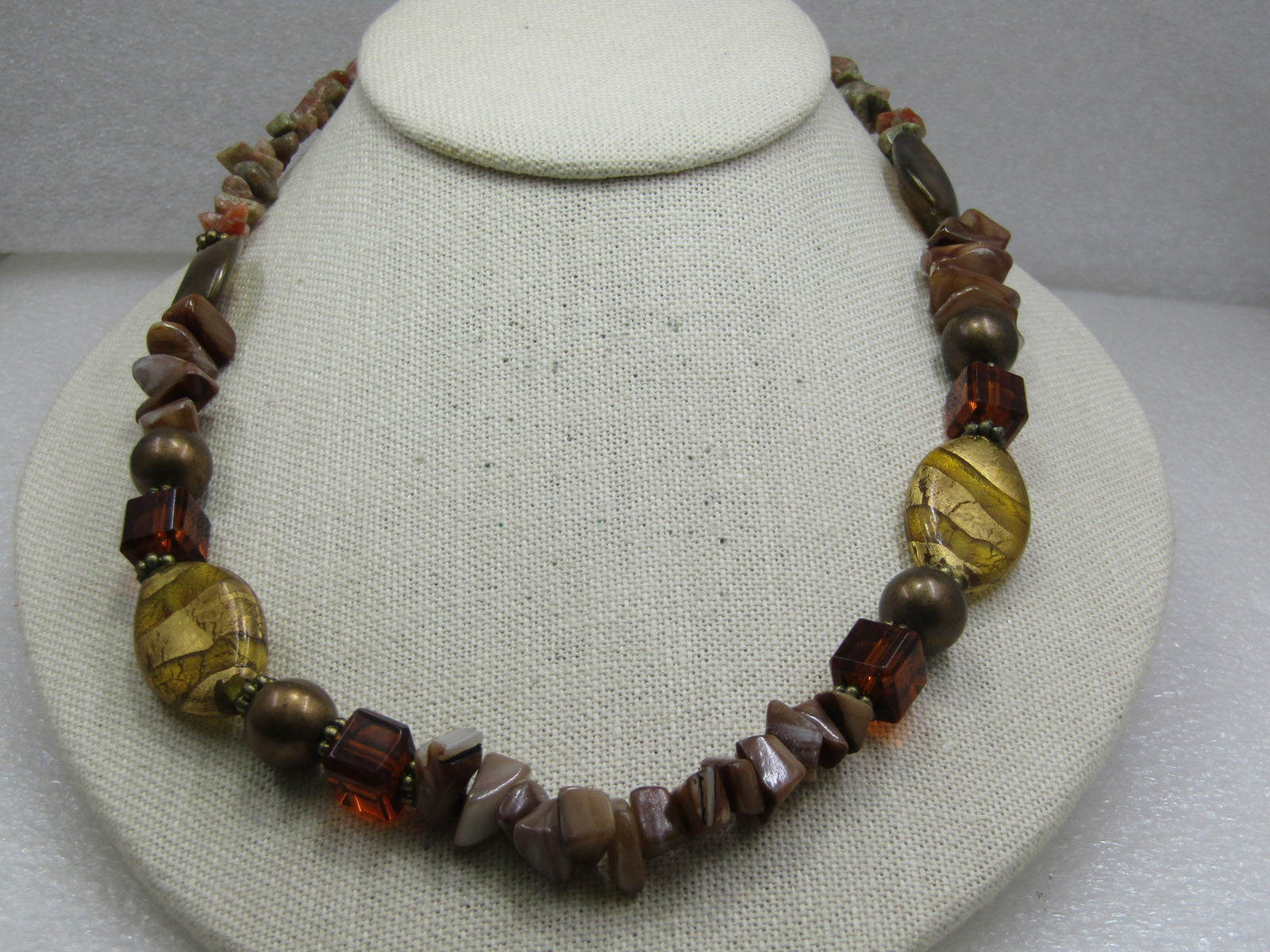 Vintage Polished Agate, Amber Glass Beaded Necklace, Premier Designs, 21": Vintage Polished Agate, Amber Glass Beaded Necklace, Premier Designs, 21". This has a mix of polished green, tan and reddish agate nuggets with gold flat oval lucite beads and brown ridge flat beads w