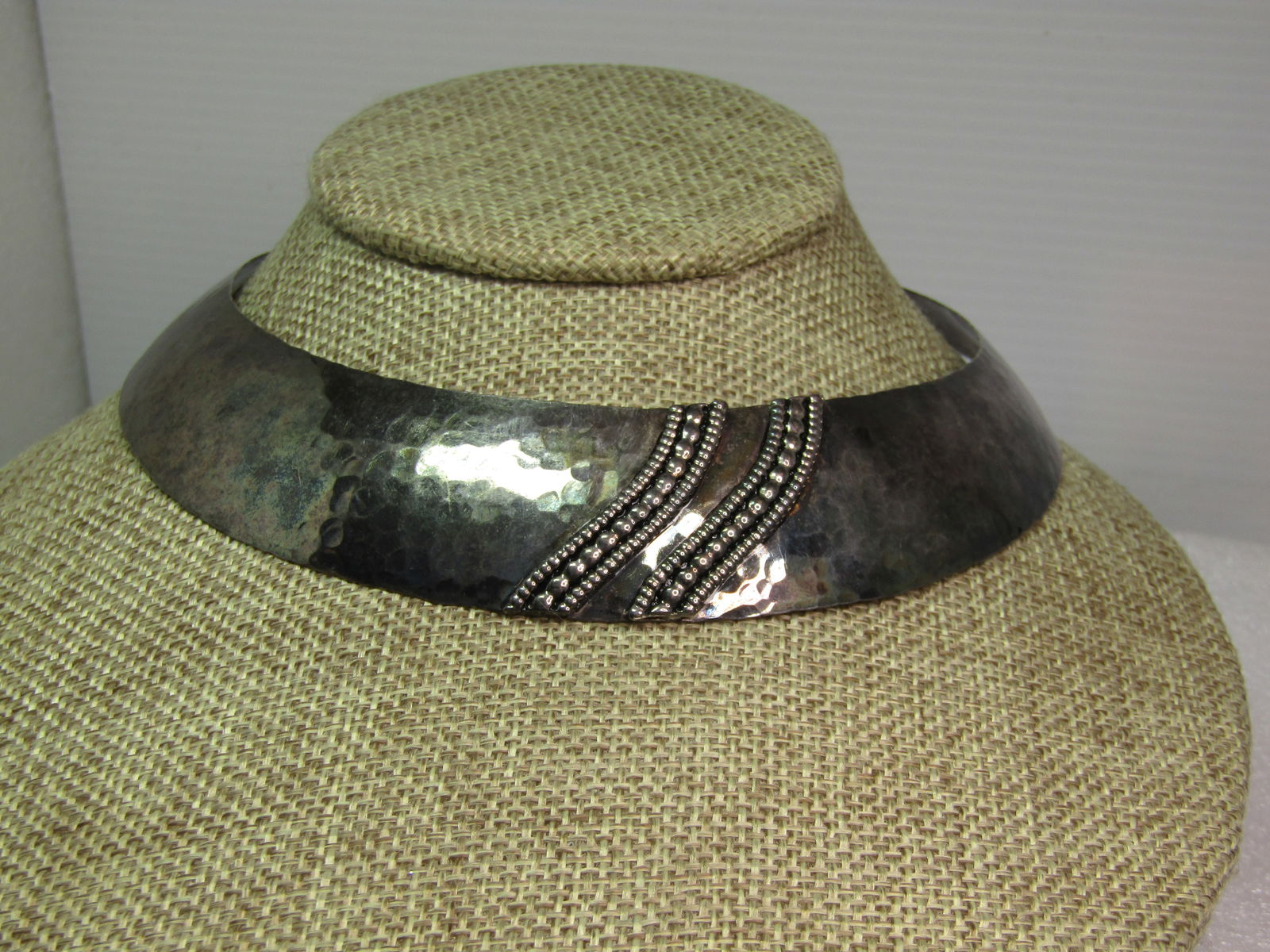 Vintage Hammered Collar Necklace with Faux Marcasite Raised Accents, 15", 1970's-1980's: Vintage Hammered Collar Necklace with Faux Marcasite Raised Accents, 15". 1970's-1980's. This is wider in the front and appx. 1-1/8" wide which slowly tapers down to appx. 1/2" then a point at the bac