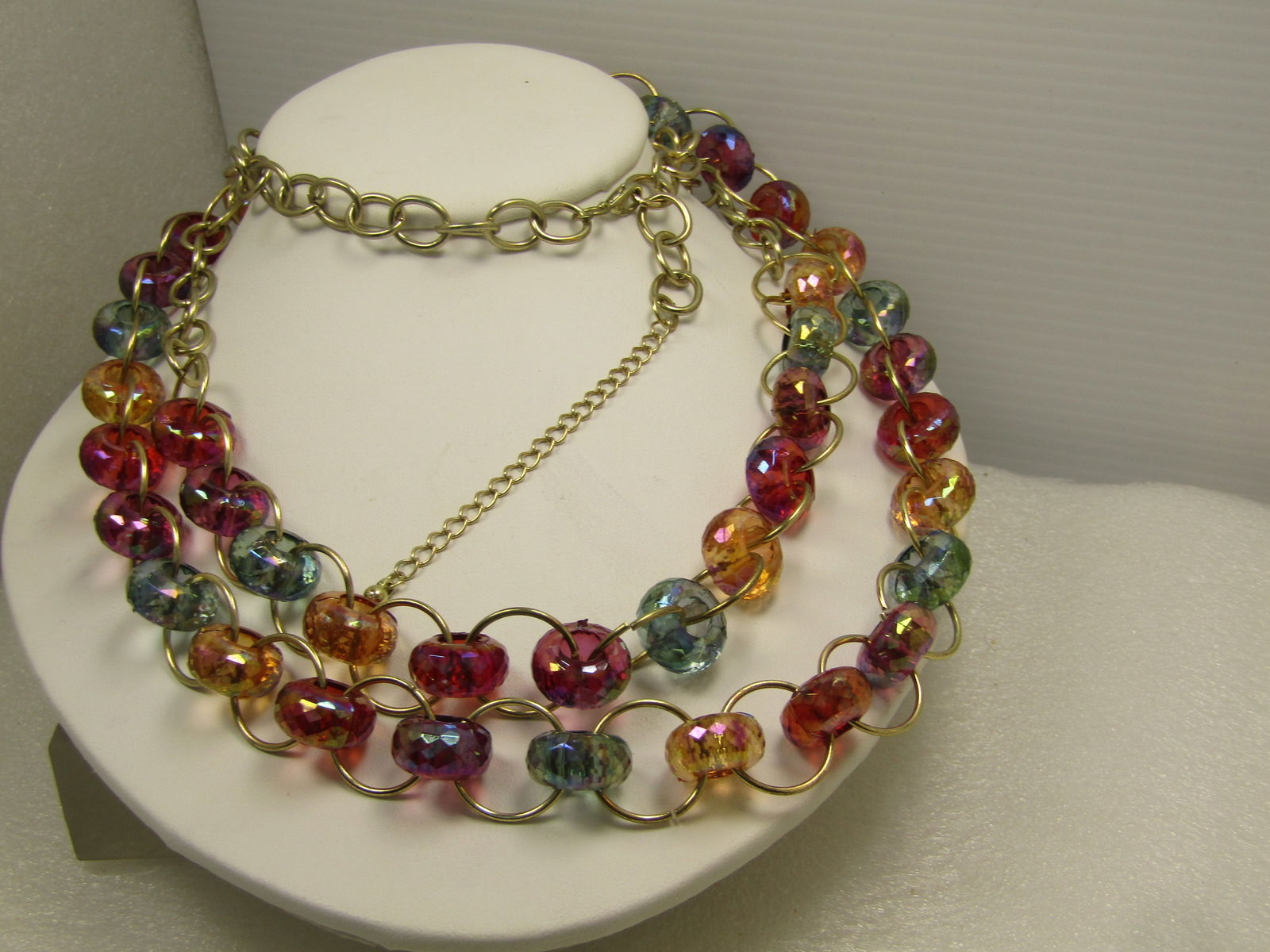 Vintage Aurora Borealis Clear Green/Orange/Pink Necklace, Double-Strand, 30"32", 1980's: Vintage Aurora Borealis Clear Green/Orange/Pink Necklace, Double-Strand, 30"32", 1980's. Yellow gold tone large round links that are joined with an acrylic clearish aurora borealis round bead with the