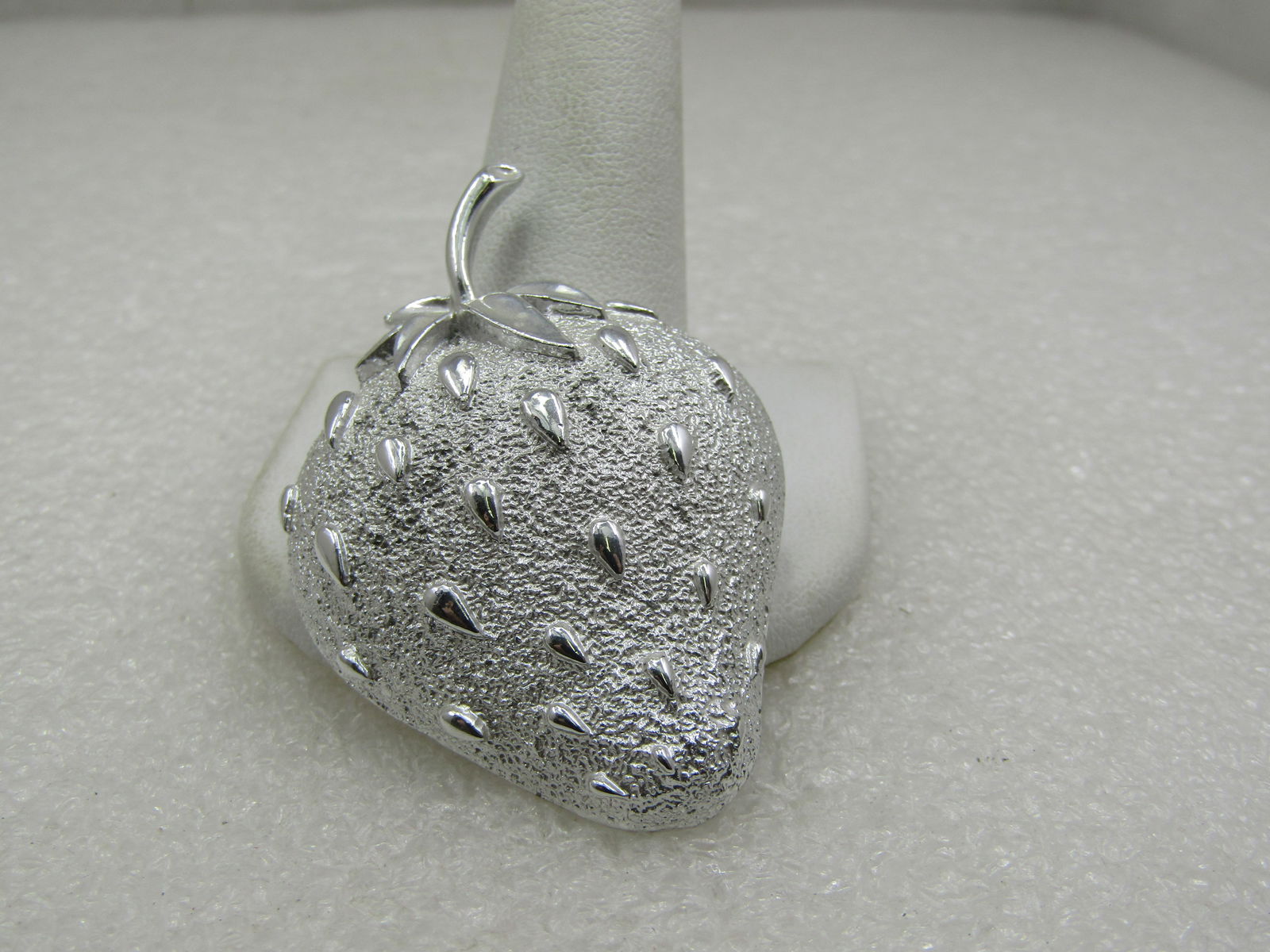 Vintage Strawberry Brooch, Sarah Coventry, 1960's-1970's,: Vintage Strawberry Brooch, Sarah Coventry, 1960's-1970's, it is 2.25" tall and 1.5" wide with a textured background to the strawberry and smooth adn shiny seeds and top cap and stem. Signed Sarah Cove