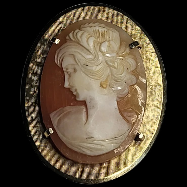 Vintage Cameo Pin/Brooch: Title: Vintage Cameo Pin/Brooch Description: Vintage Cameo Pin/Brooch Hallmarked KREMENTZ Date/Period: vintage Materials: Costume Size: 1.5 x 1.25 Reserve: $55.00 Shipping: Domestic: Flat-rate of $6